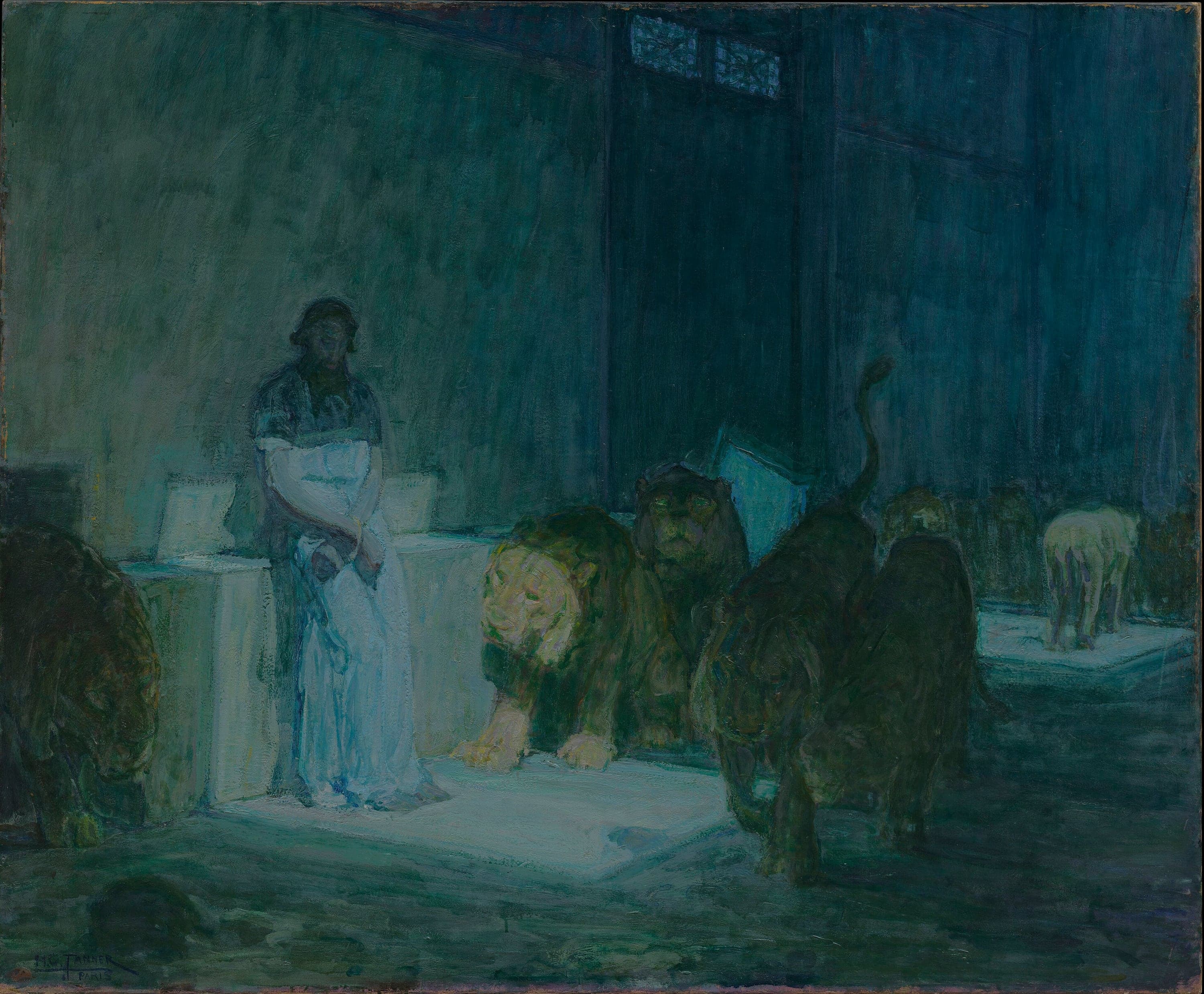 A prison den painted entirely in blue and green. At the left a man in a white robe with a dark garment over his shoulders stands with his hands bound in front of him and his head bent, lit from below the waist by a shaft of pale light that spreads across the floor in a rectangle. A small grilled window shows high in the wall at the upper right. A lion with a yellow-green mane crouches at the centre facing the viewer, a second lion behind it turns its head with glinting eyes, two lions walk away into the dark at the right, one with its tail raised, a pale lion stands on a stone ledge at the far right, and a dark lion lies at the left edge