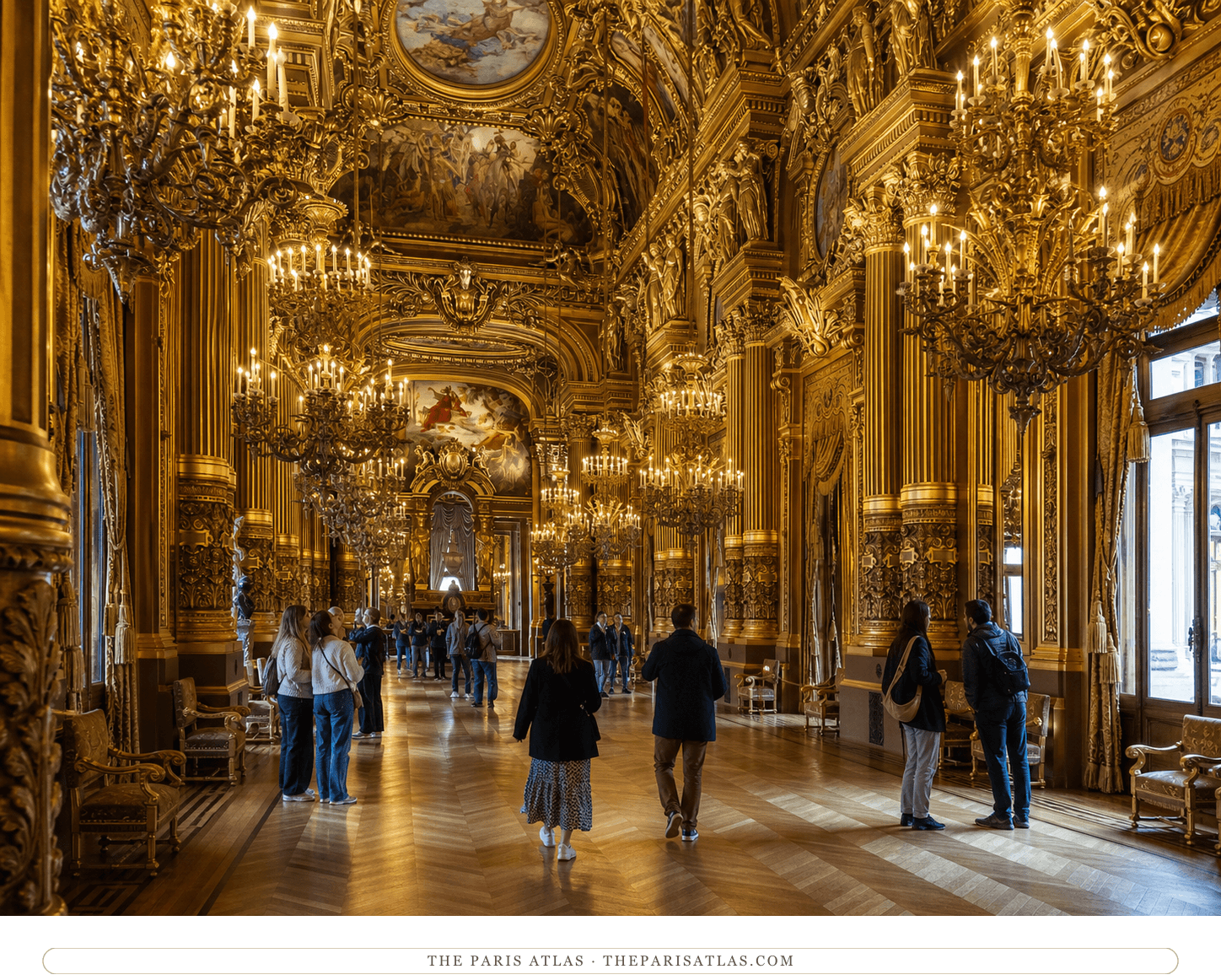Present-day visitors walking through the gilded Grand Foyer of the Palais Garnier