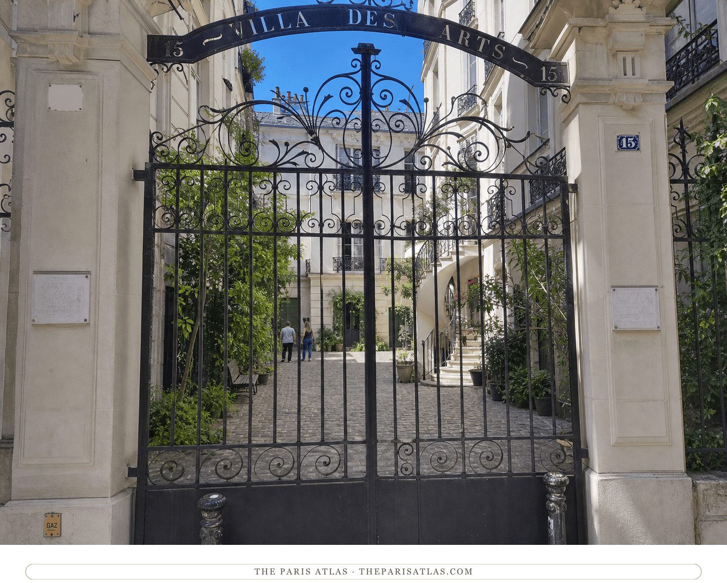 View through the Villa des Arts gate toward its cobbled courtyard and studio exteriors today