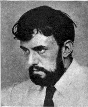 Young Aleister Crowley with dark hair and a full beard, looking to his left