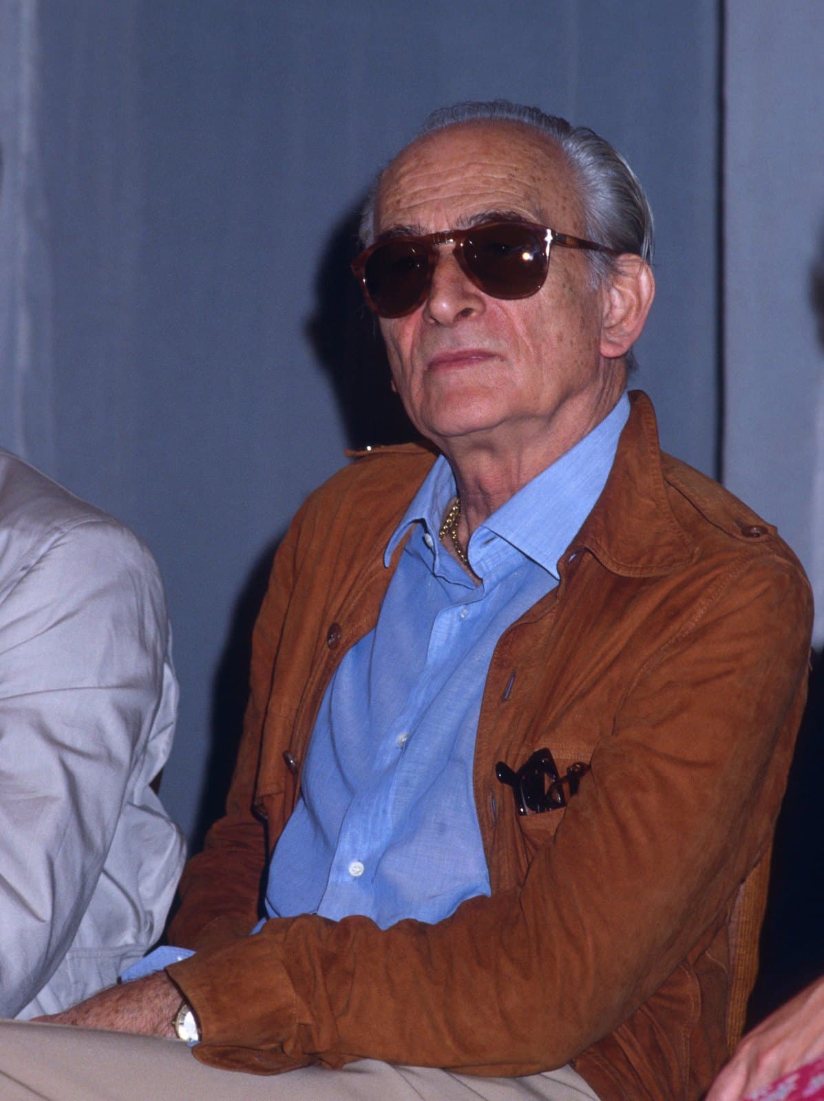 Balthus standing in a suit at the 1984 Venice Film Festival