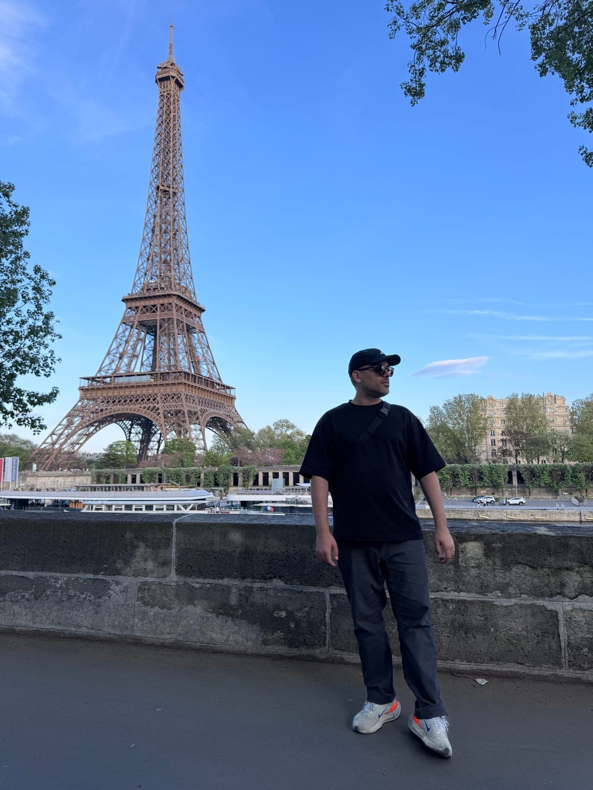 Nathan on the Seine embankment across from the Eiffel Tower