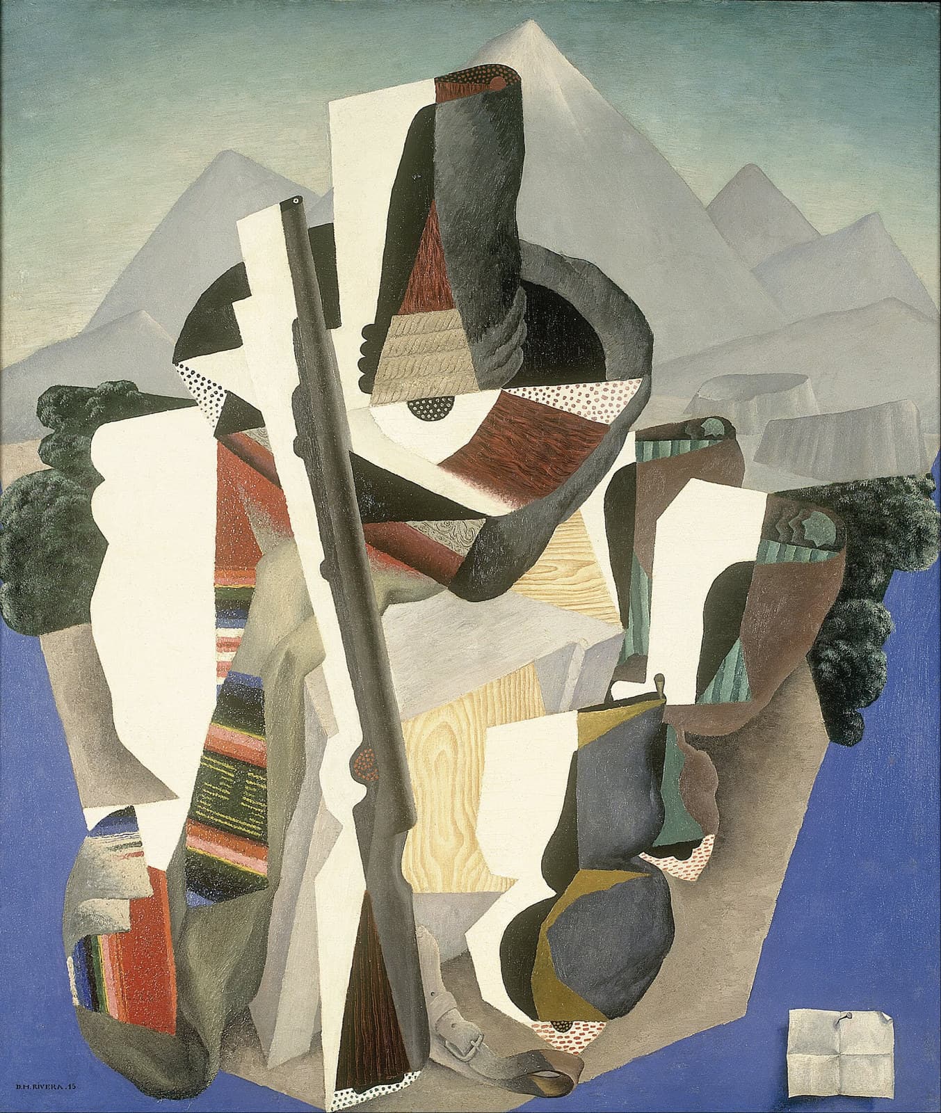 A Cubist canvas in which a long grey-brown rifle runs from top to bottom through the centre. A striped sarape in red, pink, cream, black, blue, green and yellow falls diagonally at the left. A wide dark grey-green brim curves across the upper centre above a black crown with a reddish-brown band. A pale yellow panel at the lower centre is painted with looping wood grain, and a white sheet folded in four sits on flat cobalt blue at the lower right. Flat grey triangular peaks step across the top against a pale green-blue sky, with dark green foliage clumps at both edges