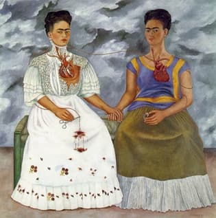 Two seated figures of the same woman, the same size, holding hands against a grey clouded sky. The figure on the left wears a white dress with a high lace collar and puffed pleated sleeves, her chest torn open to show a heart cut apart; the figure on the right wears a periwinkle blouse with yellow-gold bands and an olive skirt with a white pleated flounce, her chest open to show a whole dark red heart. A thin blood vessel crosses the sky between the two hearts at shoulder height, and the figure on the left has closed a pair of ringed surgical forceps on it, the cut end bleeding onto her white skirt