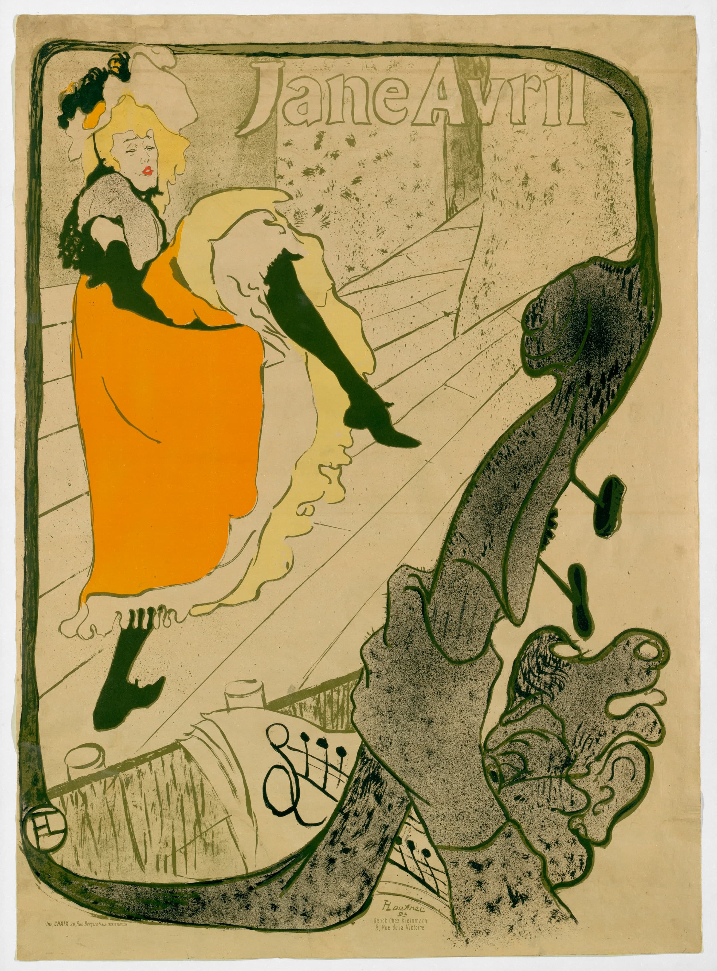 A poster of a dancer in an orange dress, black gloves and black stockings kicking one leg high on a steeply tilted stage. Pale yellow petticoats froth under her skirt, and a feathered hat sits on her loose blond hair. In the lower right the dark speckled neck and scroll of a double bass rise from the orchestra pit, gripped by a big hand. The musician's bushy-haired head fills the corner, with a sheet of music in front of him. A thick olive line frames the design, and Jane Avril is lettered in outline across the top