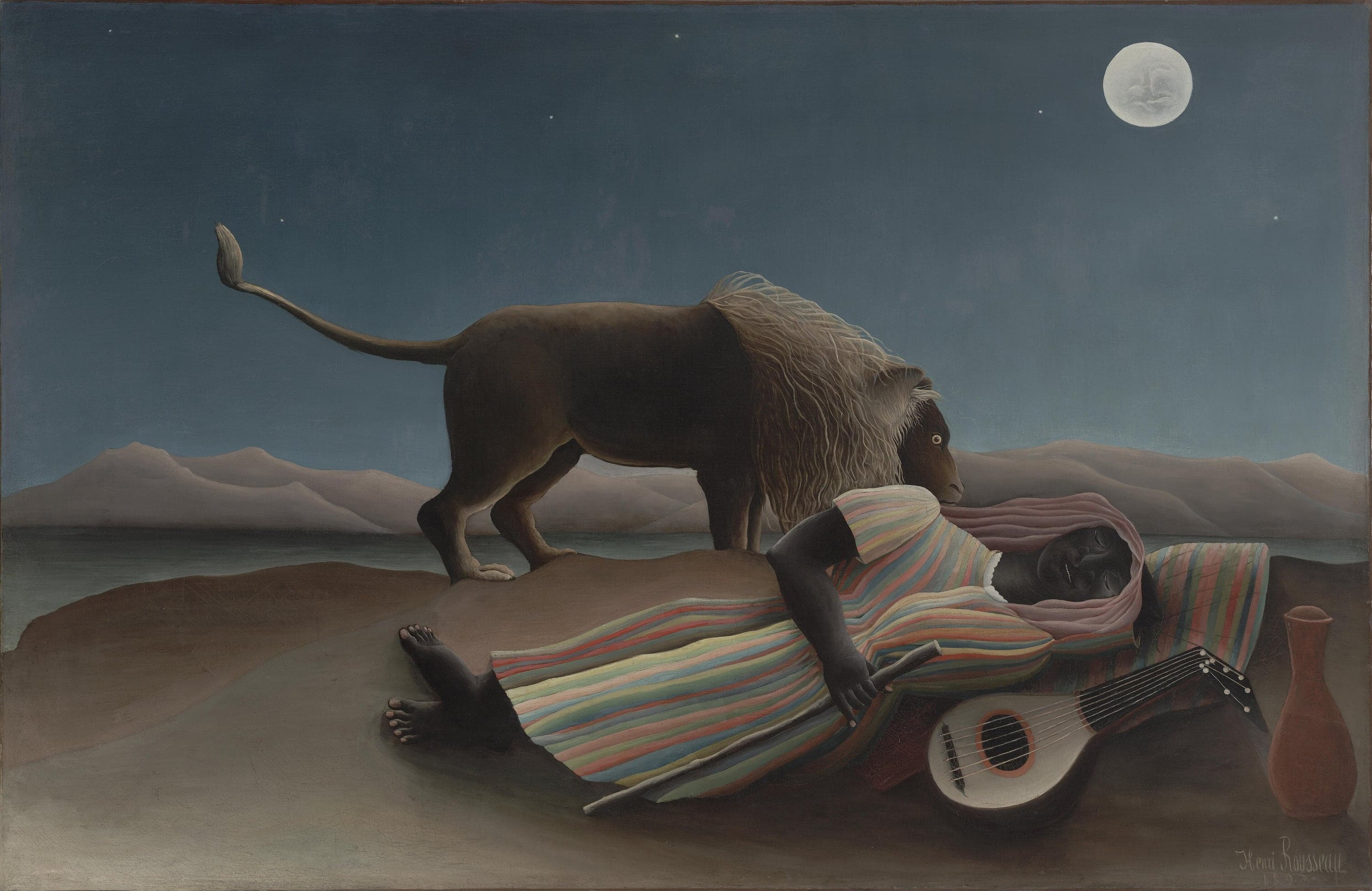 A woman in a robe striped in coral, cream, blue and green sleeps on bare ground beside a mandolin and a rust-colored jar, while a brown lion with a pale mane stands over her and smells her, under a white full moon in a dark blue sky