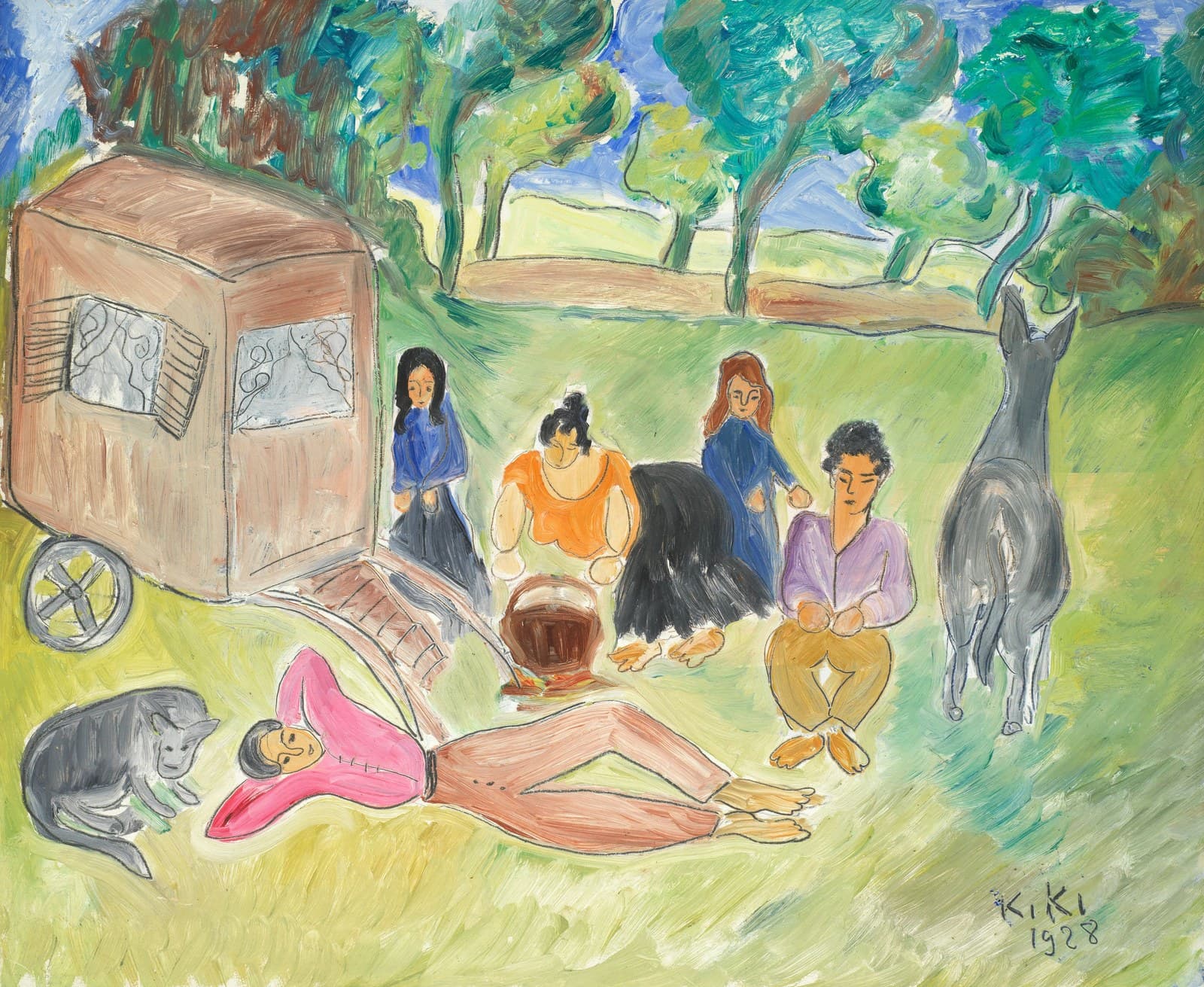A pink-brown caravan stands at the left edge of a green meadow with a spoked wheel lying flat on the grass beneath it and a slatted plank running down from its door. Five figures in orange, black, blue and lilac stand and crouch around a brown basket on the grass, a grey donkey seen from behind waits at the right, and a person in a pink jacket lies full length across the foreground with one arm folded over their head and a grey cat beside them. Green and blue-green trees and a strip of pale field close the background