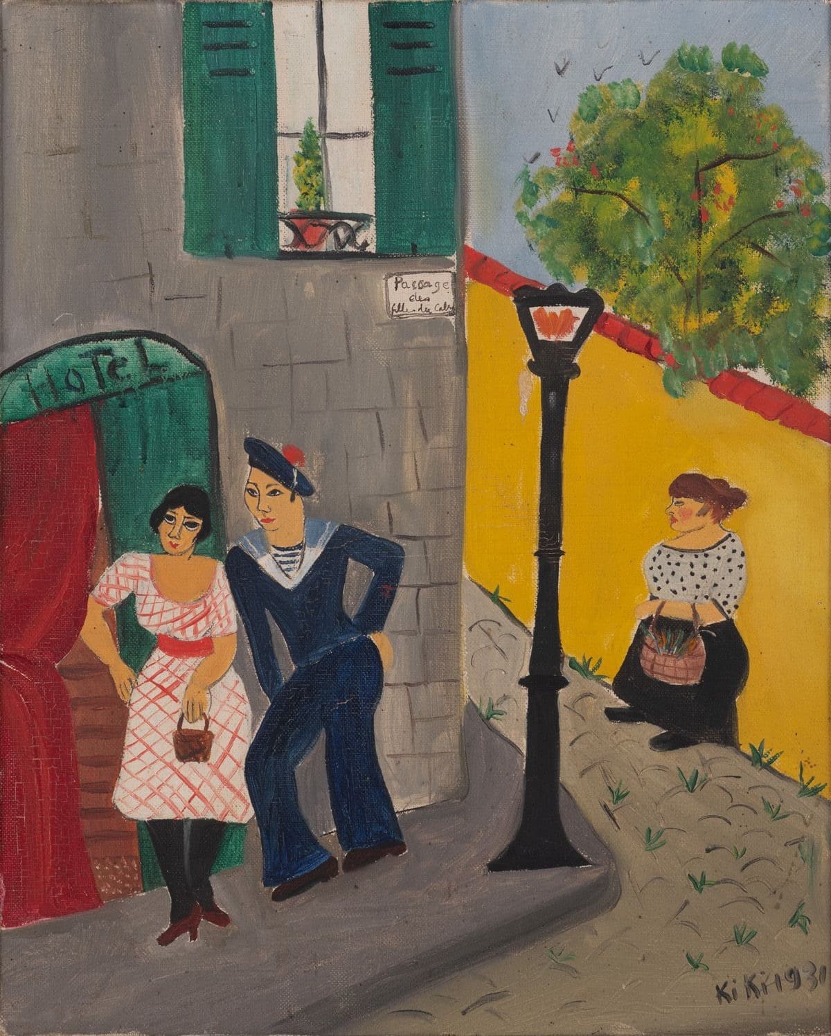 A street corner in flat colour. At the left a green awning lettered Hôtel curves over a doorway with a red curtain inside it. A woman stands in the opening in a white dress cross-hatched in pink with a red sash, black stockings and dark red shoes, holding a small brown basket. A sailor leans against the grey stone beside her with a hand on his hip, in a navy cap with a red pompom, a white square collar over a blue and white striped undershirt, and navy trousers. A small white plaque on the wall reads Passage des filles du Calvaire. A black lamppost with an orange flame in its white lantern rises through the centre. Across the road a second woman in a black-spotted white blouse and long black skirt stands against a yellow wall, a wicker basket of green stems in her hands. A tree with red fruit rises behind the wall, and birds cross a pale blue sky