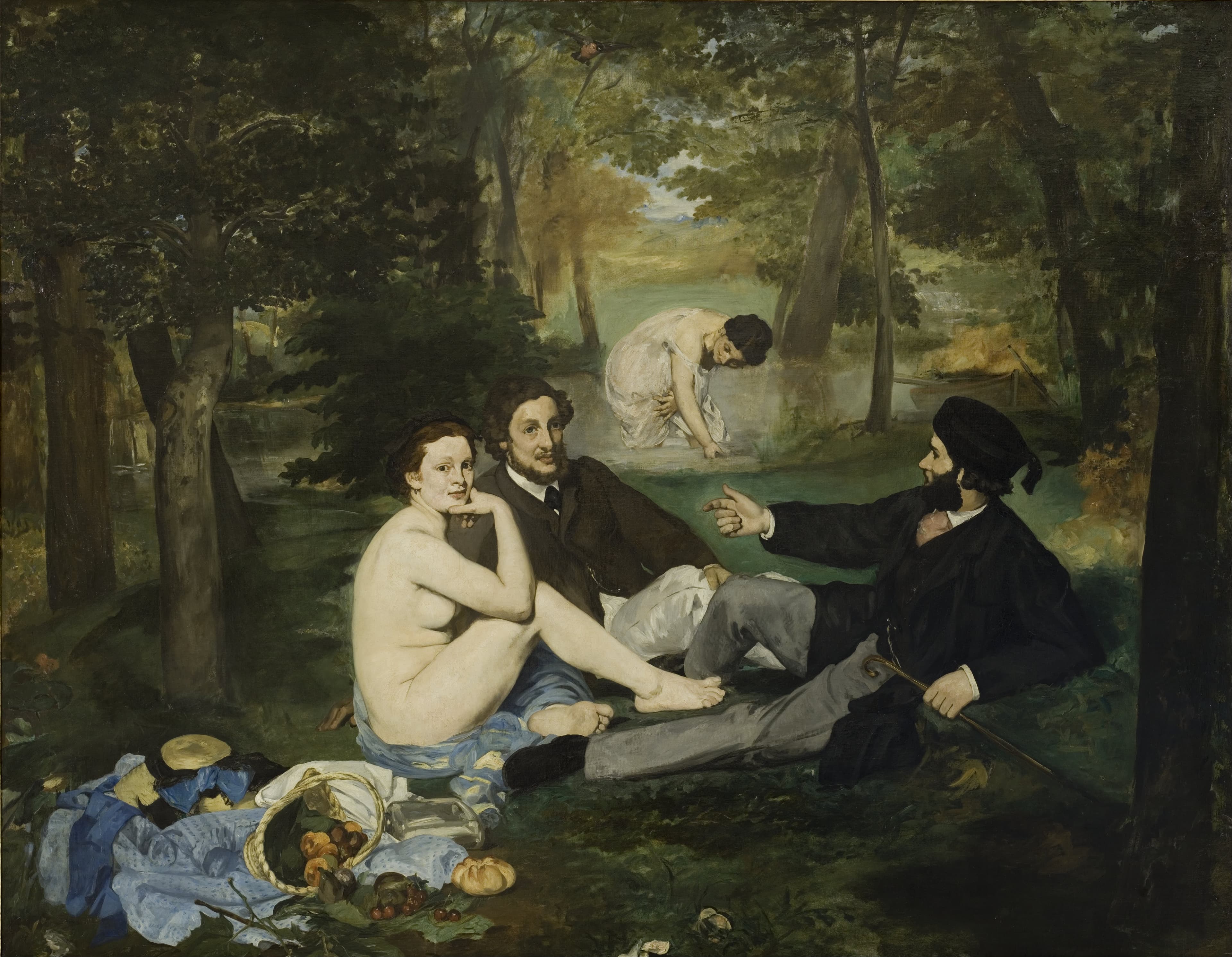 A nude woman and two dressed men seated in woods, with picnic food in front and a bather behind
