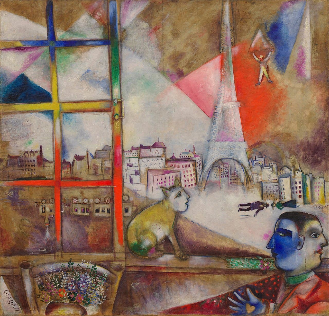 A window seen from inside a room fills the left third of the canvas, its glazing bars painted blue across the top, then yellow, then green, with a long red vertical running down the frame. Beyond it the Eiffel Tower rises in thin pale lines against a red field, above white and pink city blocks. At the upper right a figure hangs beneath a pointed canopy with both arms raised. A cat with a human face sits on the sill at the centre bottom, its body yellow and green. In the lower right corner a single head carries two profiles, blue facing left and pale facing right, above an open hand on red. A planter of small flowers sits on a rail at the lower left