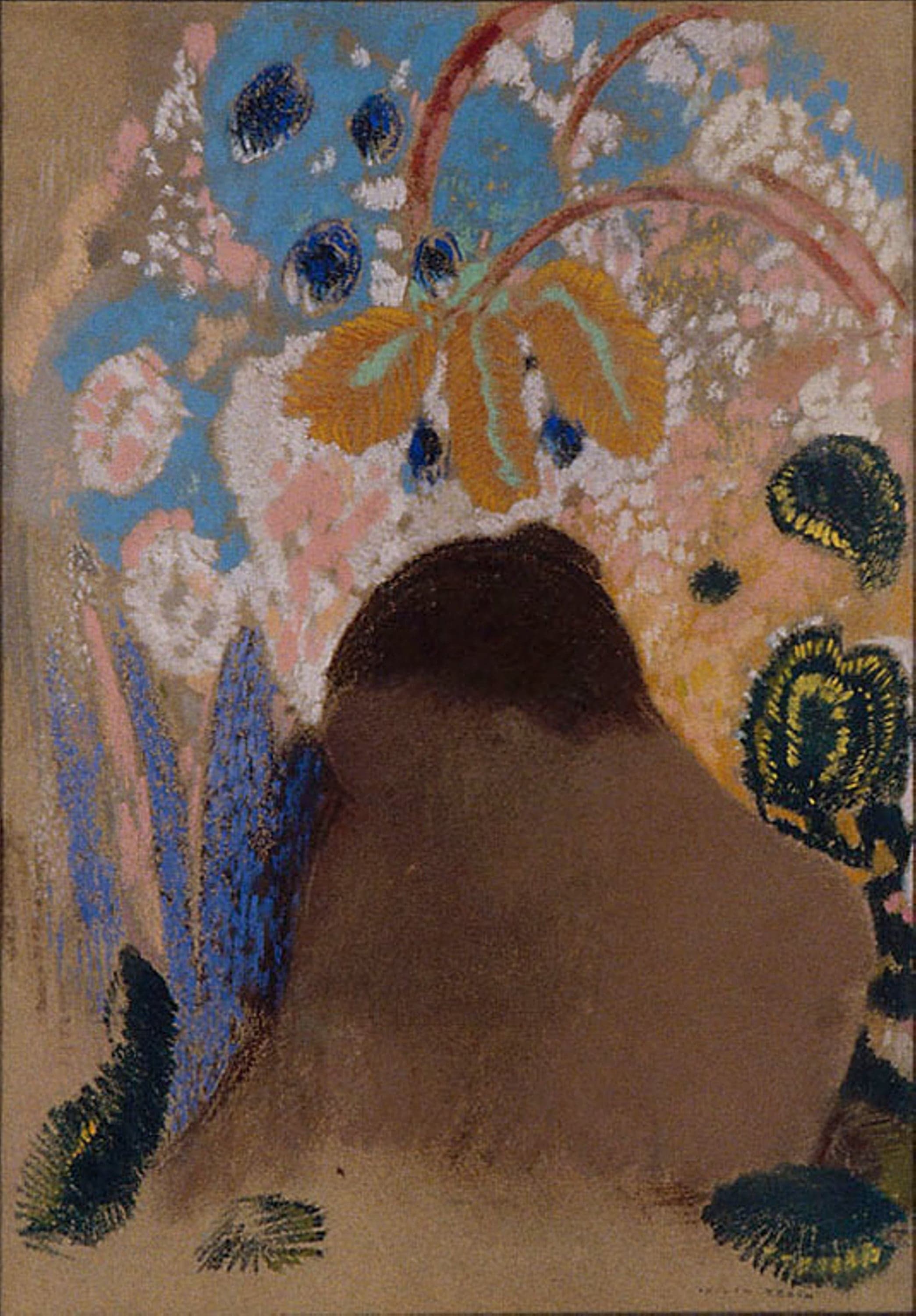 A large soft brown shape, readable as a head and shoulder in shadow, rises from the bottom of a warm tan sheet beneath a crowd of white clustered blossoms, deep blue blooms, an orange leaf spray and dark green fronds, with patches of sky blue at the top