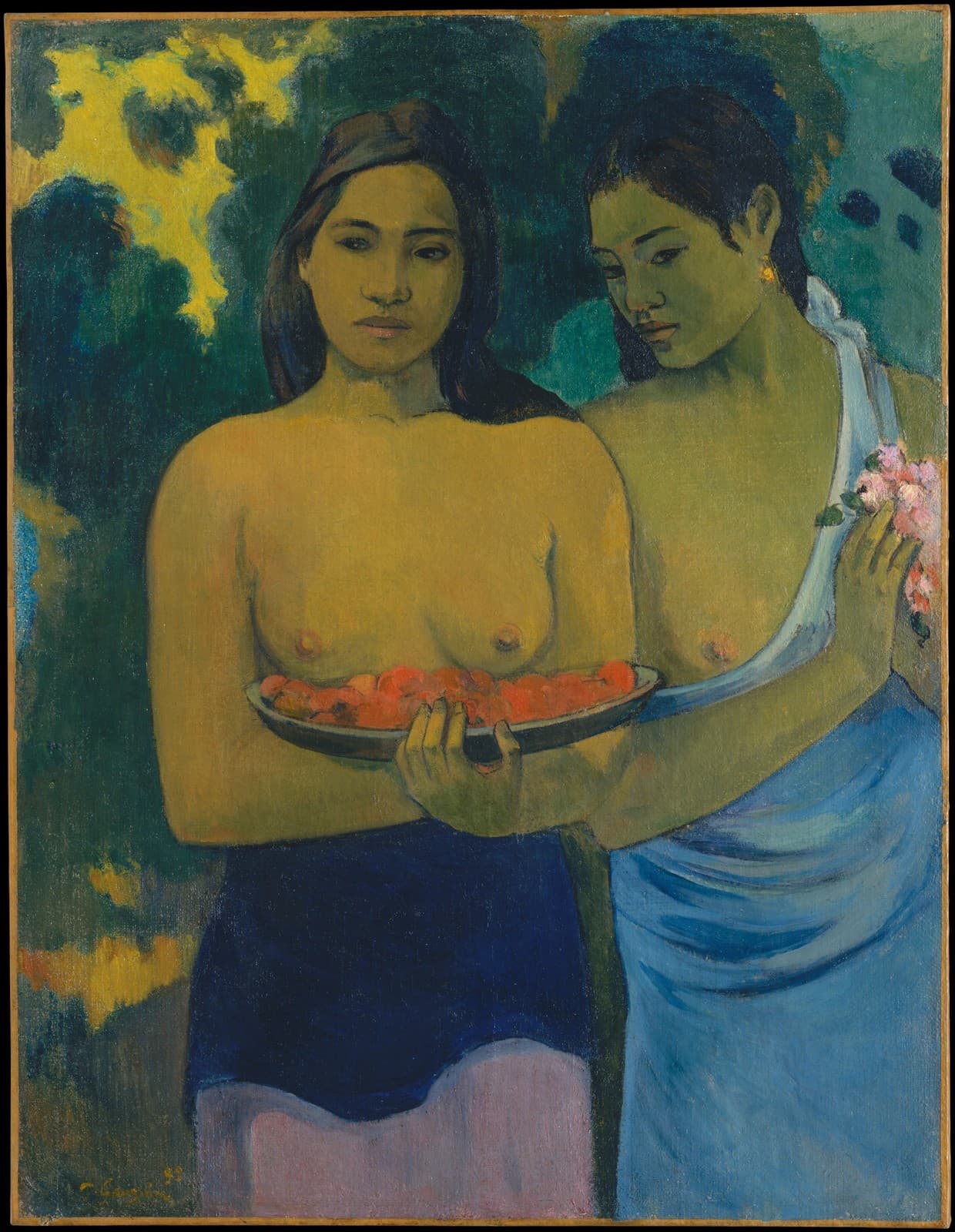 Gauguin's Two Tahitian Women: two women stand close together against a green ground, one carrying a wooden tray of mango blossoms, the other holding a spray of blossoms to her chest