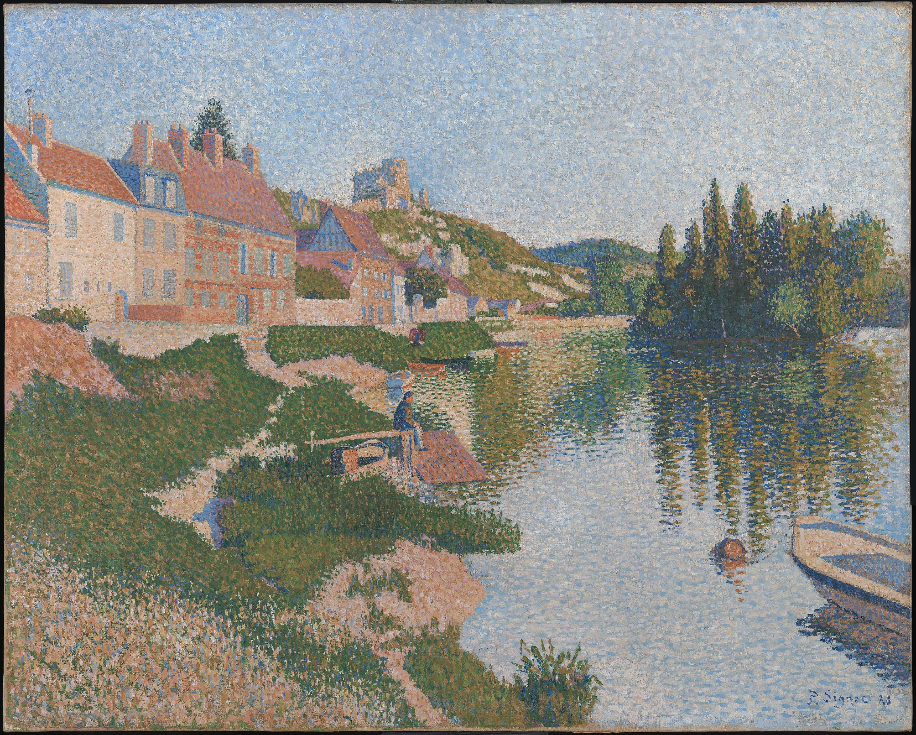 A stretch of the Seine at Les Andelys painted in small separate touches of colour. Village houses with cream stucco walls, a red brick front and orange-red tiled roofs line the left bank, and above them a green chalk hill carries the broken stone keep of Château Gaillard. A man in a blue smock sits on a moored boat with a broad salmon-coloured roof. Poplars on the far right bank throw blue and gold reflections into the water, and a pale boat and a round orange float sit at the lower right