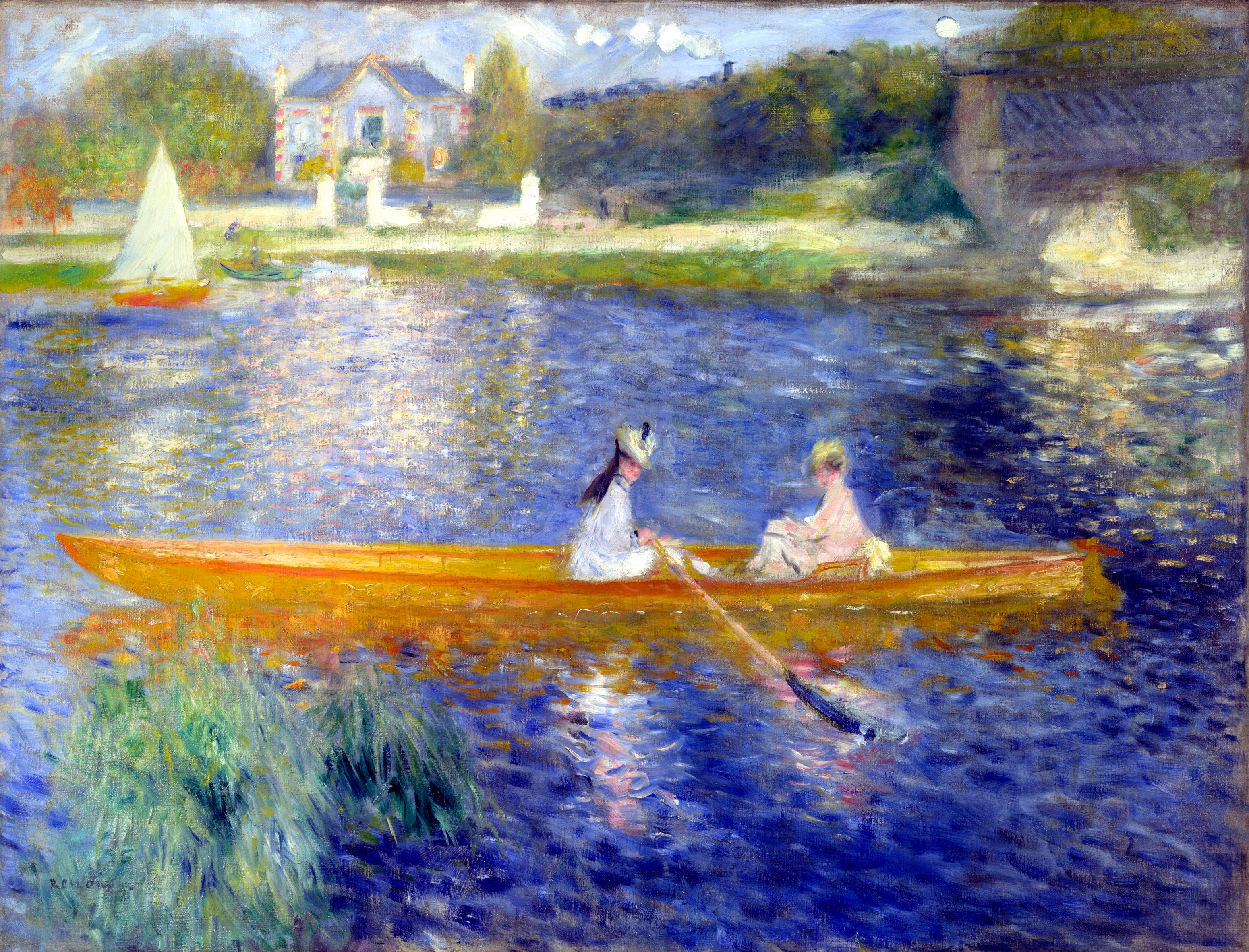 An orange and gold skiff crosses the lower half of the canvas on blue water, carrying two women. The nearer one, in a pale dress and a straw hat with dark trim, works an oar that runs down to the right into the water; the second sits facing her, bareheaded, in pink and cream. Beyond them a sailboat with a white triangular sail and a red-orange hull lies near a low green boat, and the far bank carries a pale villa with a slate roof, a white fence and small dark figures. A railway bridge with diagonal cross-bracing crosses the right side, with a line of thick white steam dabs above the trees, and a clump of green reeds rises from the water at the lower left