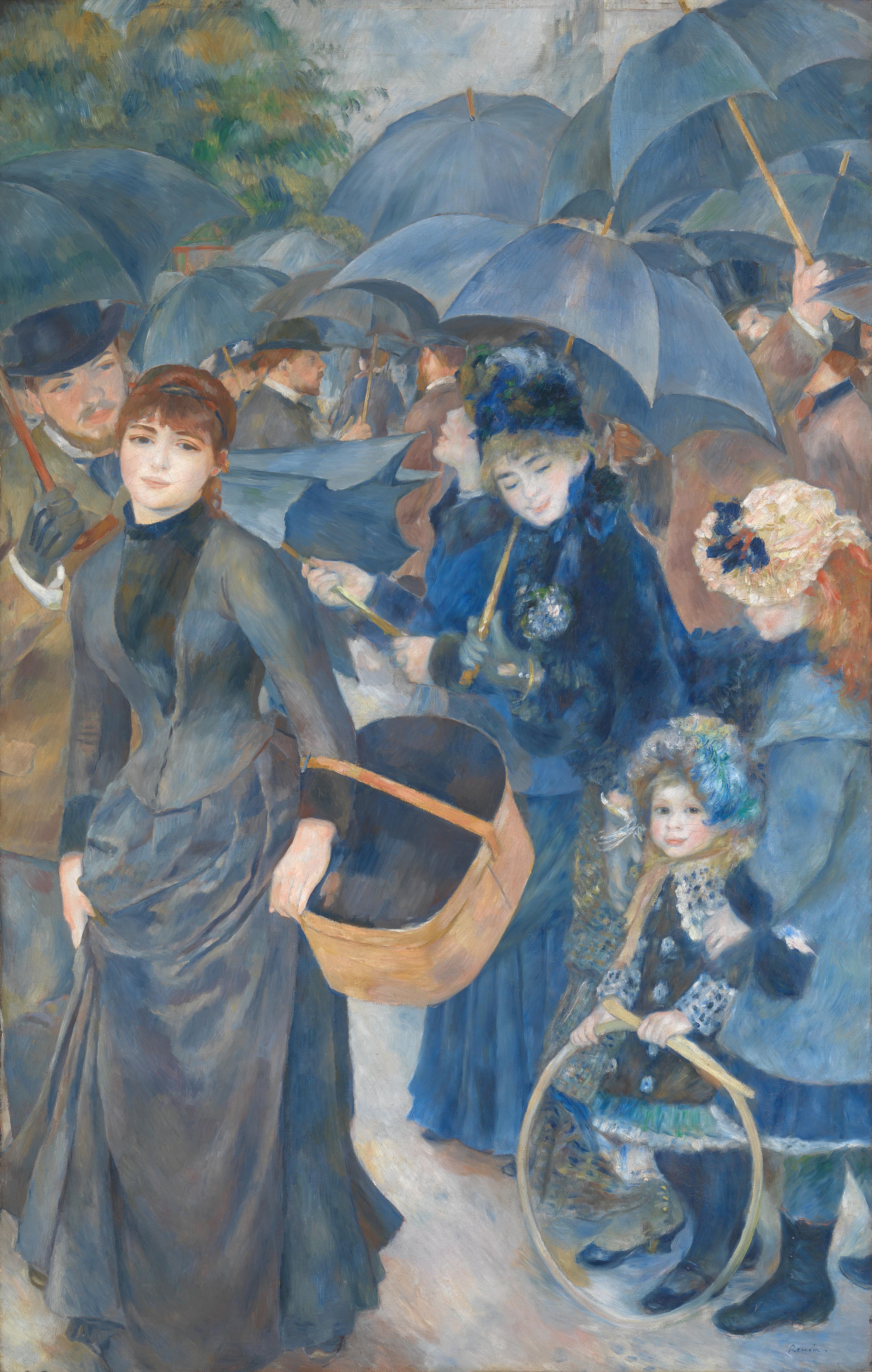 A crowd on a Parisian street beneath a canopy of overlapping slate blue-grey umbrellas. At the far left a bareheaded young woman in a grey-blue jacket and skirt looks out at the viewer, a large open bandbox on her left arm and her bare hand on its rim. Behind her a man in a dark bowler hat grips a red-brown umbrella handle in a dark glove. At the centre a woman in a blue and green bonnet and fur-trimmed cape looks down, a round posy pinned at her chest. At the right a small girl in a navy coat with speckled lace trim and a plumed bonnet holds a wooden hoop and stick in both hands, with an older girl in a cream lace bonnet behind her. A tree and a grey apartment block show above the umbrellas
