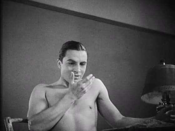The Poet staring at a living mouth in his palm in Jean Cocteau's The Blood of a Poet