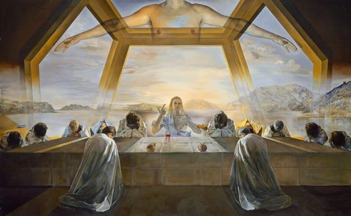 The Sacrament of the Last Supper: Christ at a table with twelve hooded kneeling disciples inside a transparent twelve-sided solid, a headless torso with open arms above, over a bay at dawn