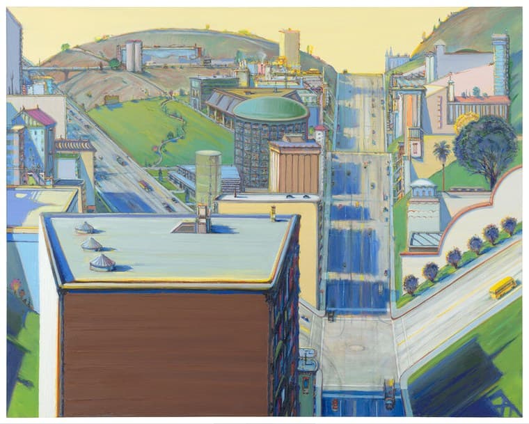 A city seen from above under a flat pale yellow sky, with bare hills meeting at the top. A flat-roofed block fills the lower left, its pale blue-green roof carrying three conical vents in a diagonal file that throw hard blue shadows to the right, above a flat brown facade. A cobalt street plunges down the centre, a multi-lane freeway curves through green lawn at the left, and at the right six violet-blue trees stand on a verge above a pale road carrying a single yellow school bus
