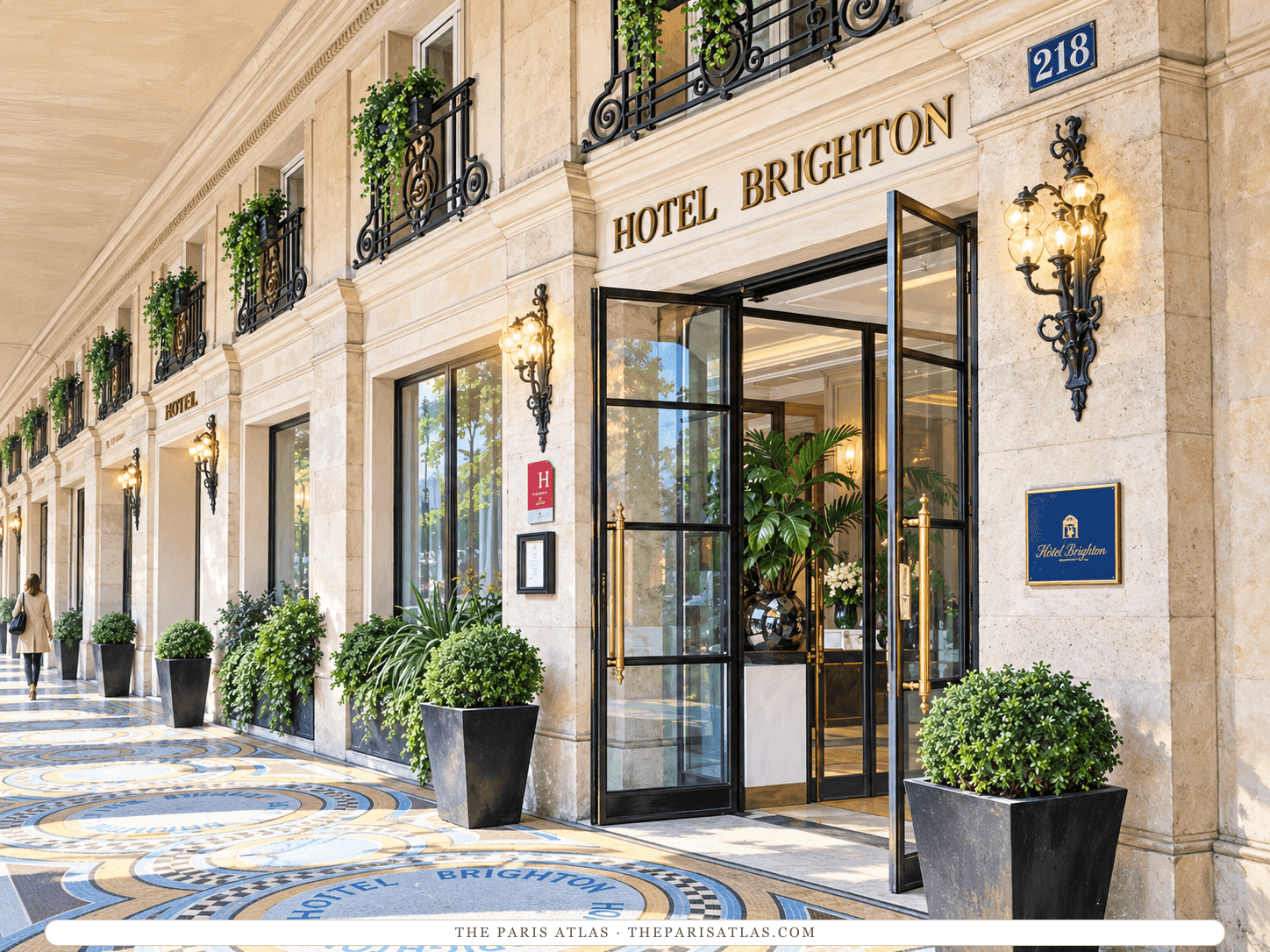 Reference-based illustration of the entrance of Hôtel Brighton under the rue de Rivoli arcade: stone walls lettered Hotel Brighton, the number 218, a tall black-framed glass door, brass lanterns, box shrubs and a mosaic floor.