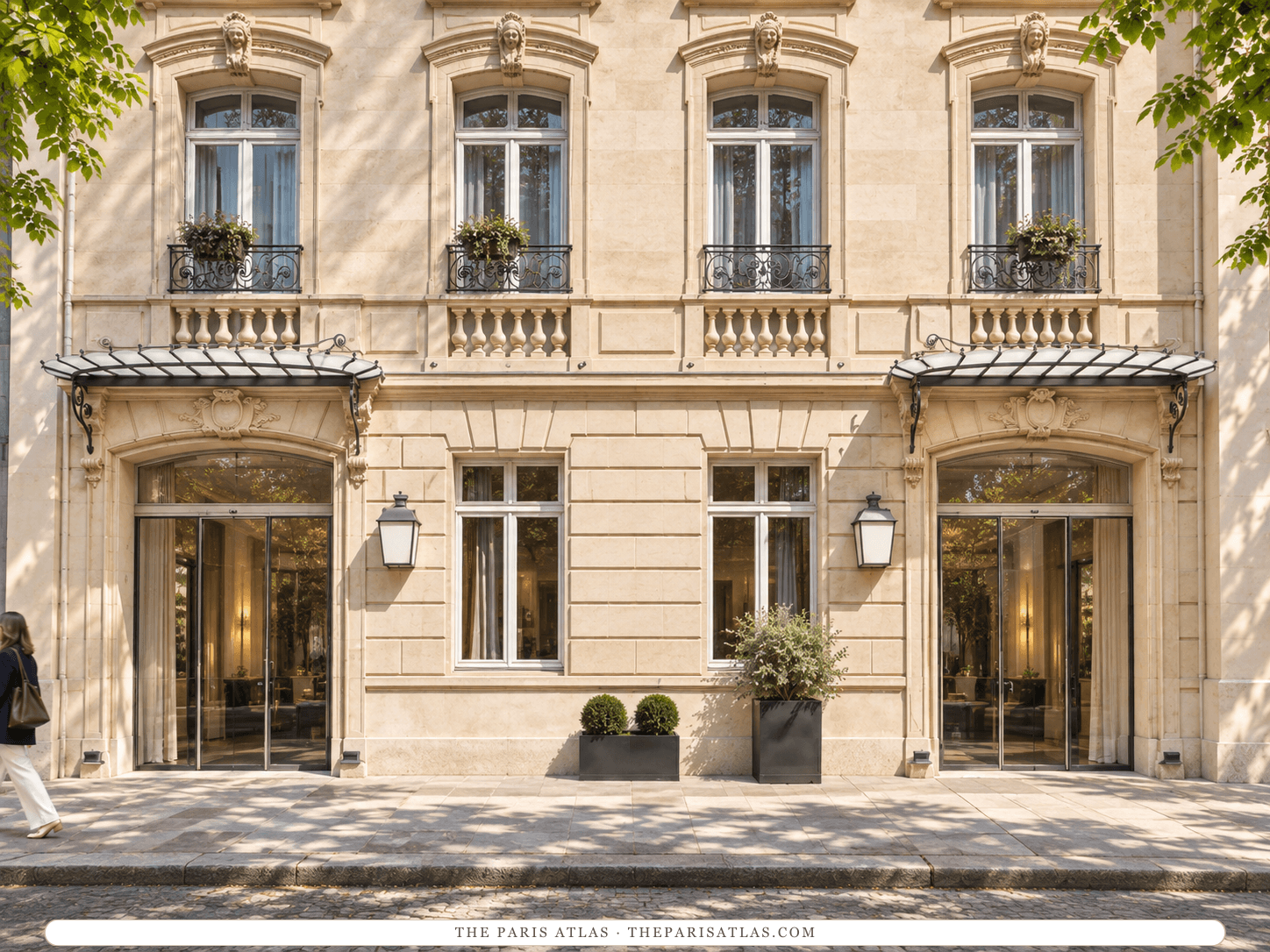 Reference-based illustration of the lower floors of Hôtel de Sers: a pale limestone front with two glass doorways under iron-and-glass canopies, lanterns between them, carved heads above the upper windows and small iron balconies.