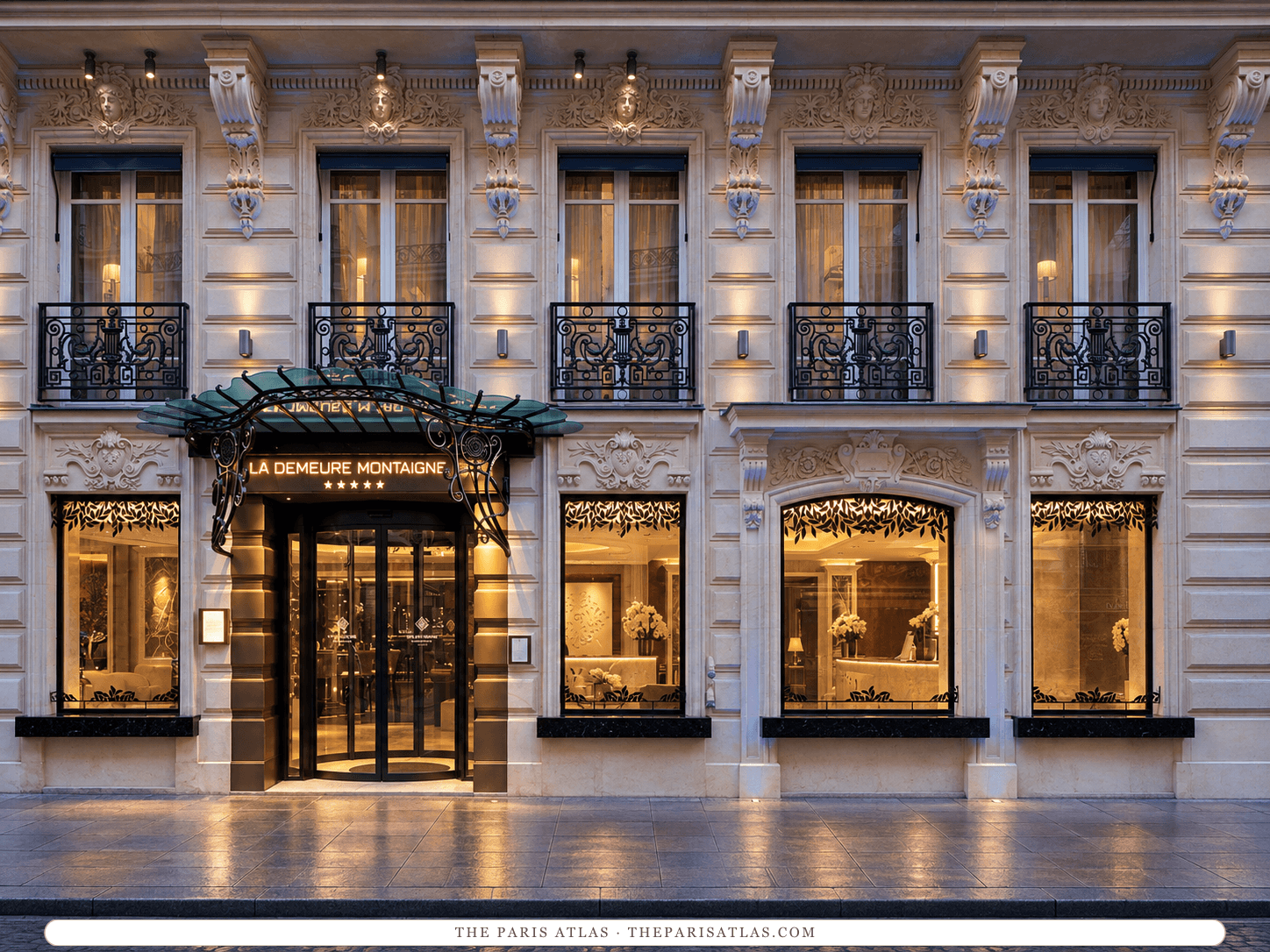 AI-generated illustration of La Demeure Montaigne on rue Clément-Marot at dusk: a carved stone façade with wrought-iron balconies, an ornate glass canopy over the revolving-door entrance and lit display windows on either side.