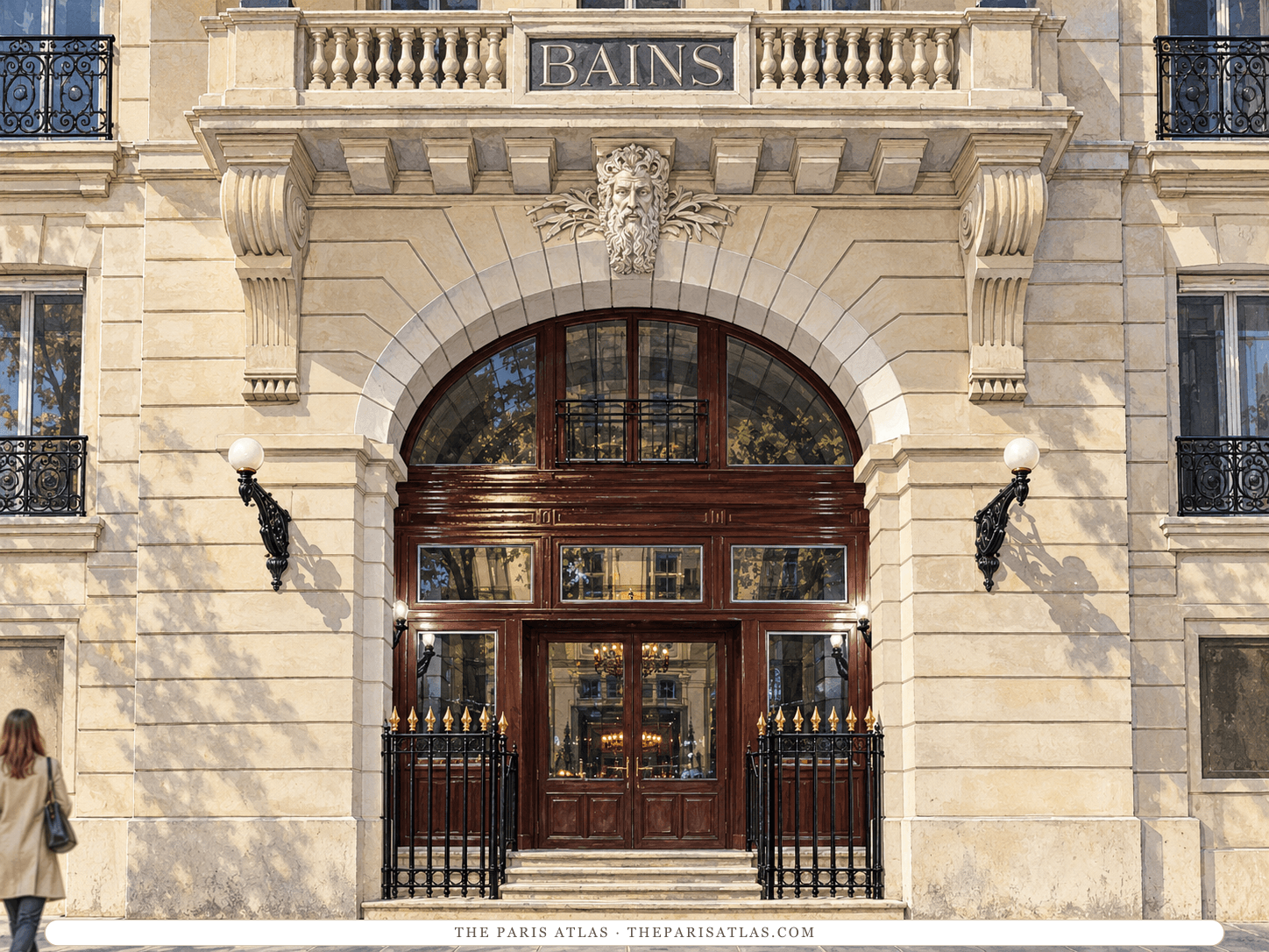 Reference-based illustration of the entrance of Les Bains Paris: a pale stone archway with a carved mask above dark wooden doors and an arched fanlight, iron railings and wall lanterns, and a sign reading Bains on the balcony above.