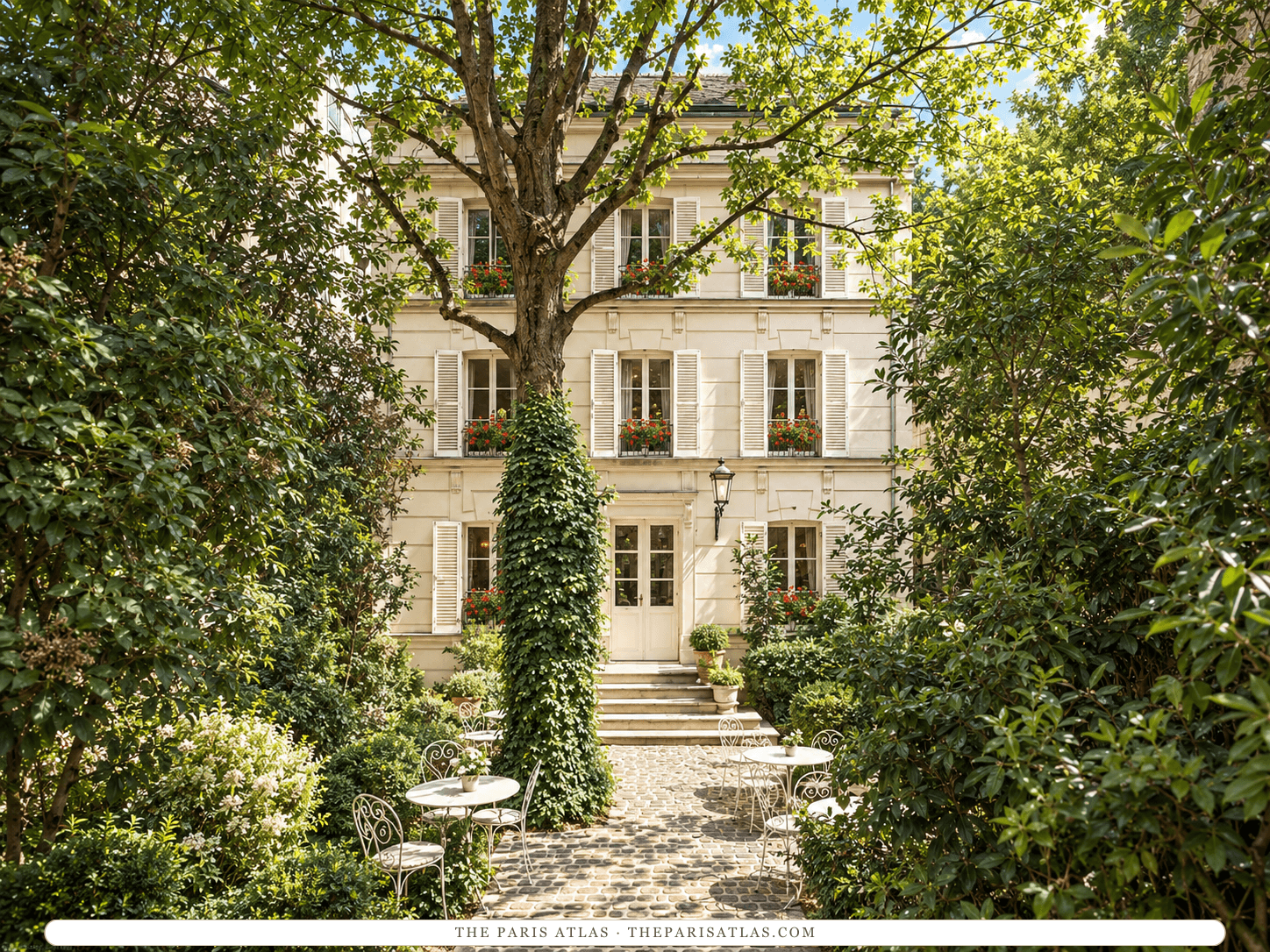 Reference-based illustration of Hôtel Particulier Montmartre: a white three-storey house with shutters and red window boxes behind a tall tree with an ivy-covered trunk, and a cobbled garden path set with small white tables and chairs.