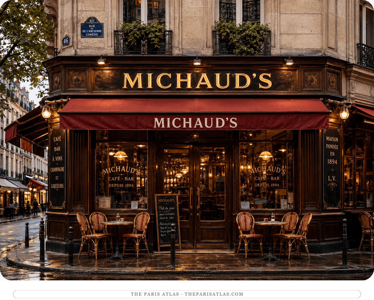 Michaud's corner façade in warm evening light, red awning and gilded lettering over the terrace tables
