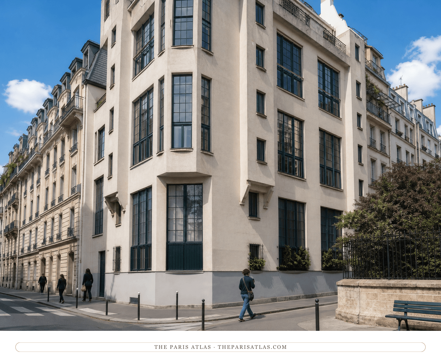 Color street view of the cream façade and tall studio windows at 11 bis rue Victor-Schœlcher