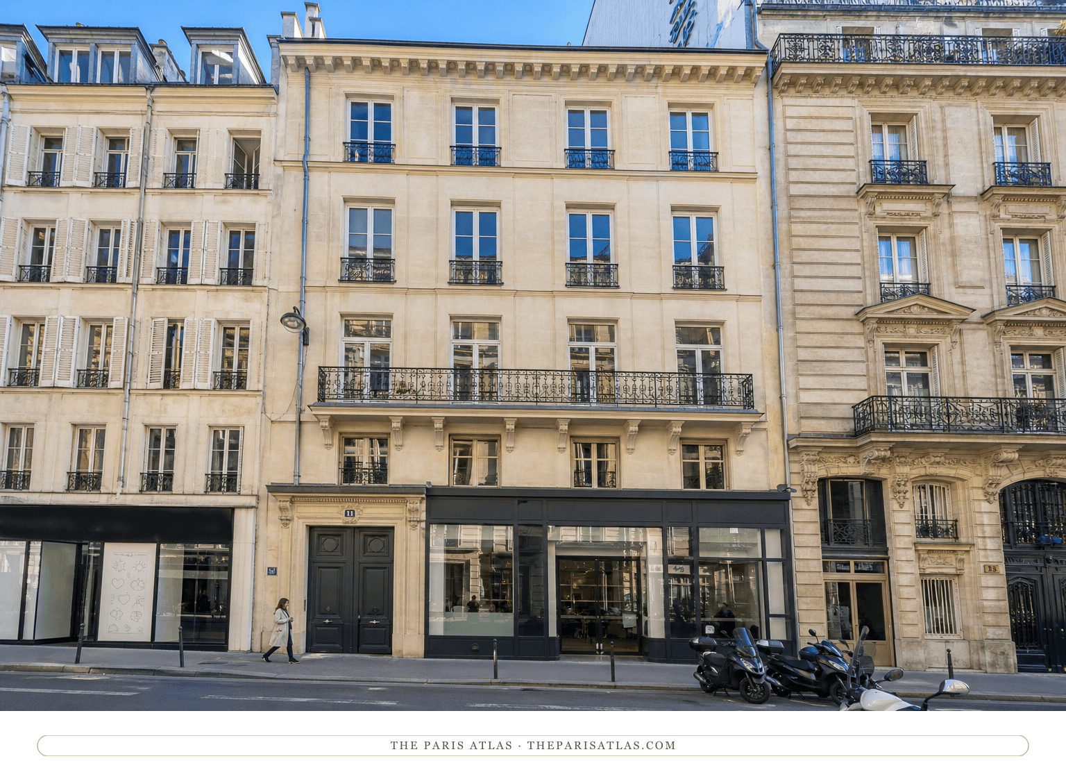 Colour photorealistic view of 11 rue Le Peletier beneath a bright blue sky