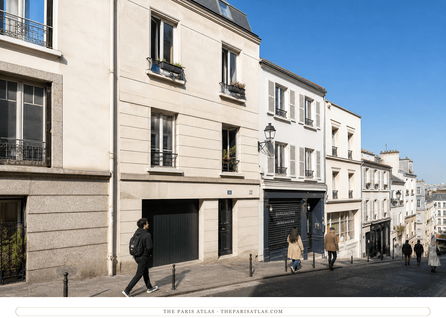 Bright color view of pedestrians beside number 16 on the sloping rue Ravignan