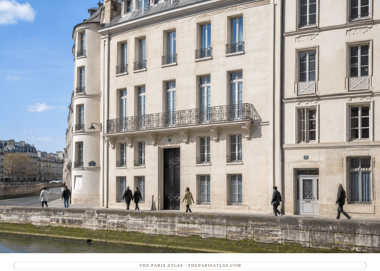 Bright color view of pedestrians beside the pale stone façade at number 24