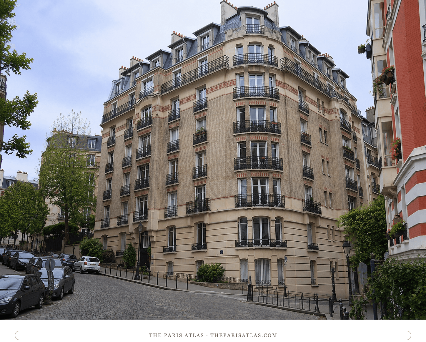 The apartment building at 4 rue Girardon today, pale stone and iron balconies above the cobbled Montmartre hillside