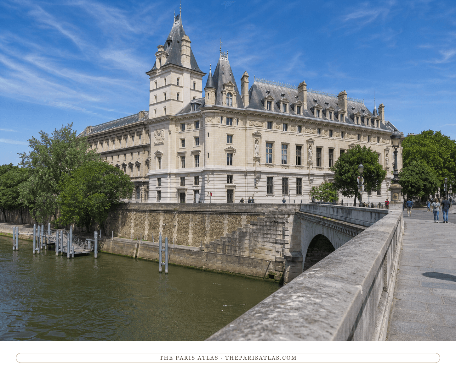 Bright present-day color view of the Palais de Justice extension beside the Seine