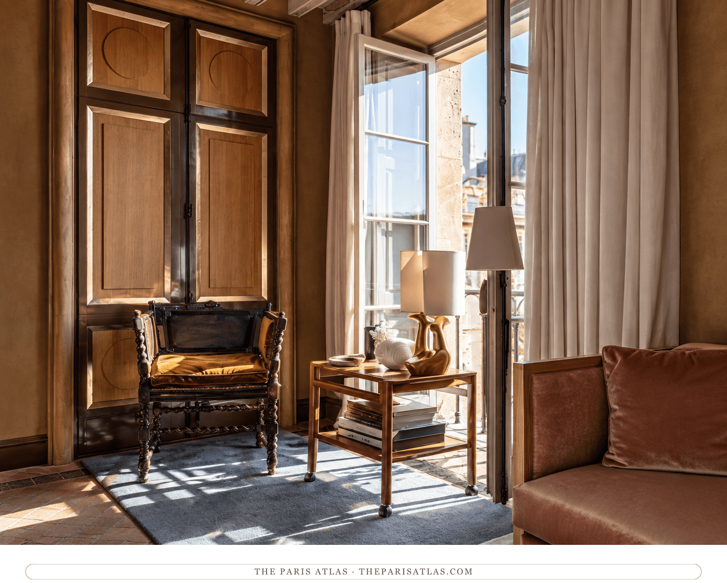 A suite sitting area at Cour des Vosges — illustration.