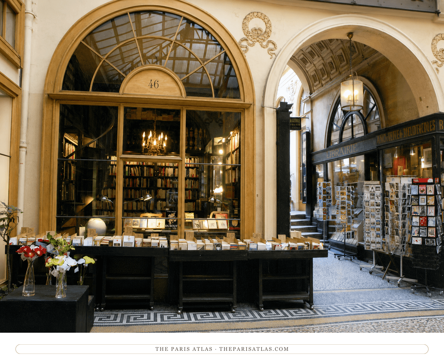 The Galerie Vivienne passage in colour, mosaic floor, shopfronts and glass roof