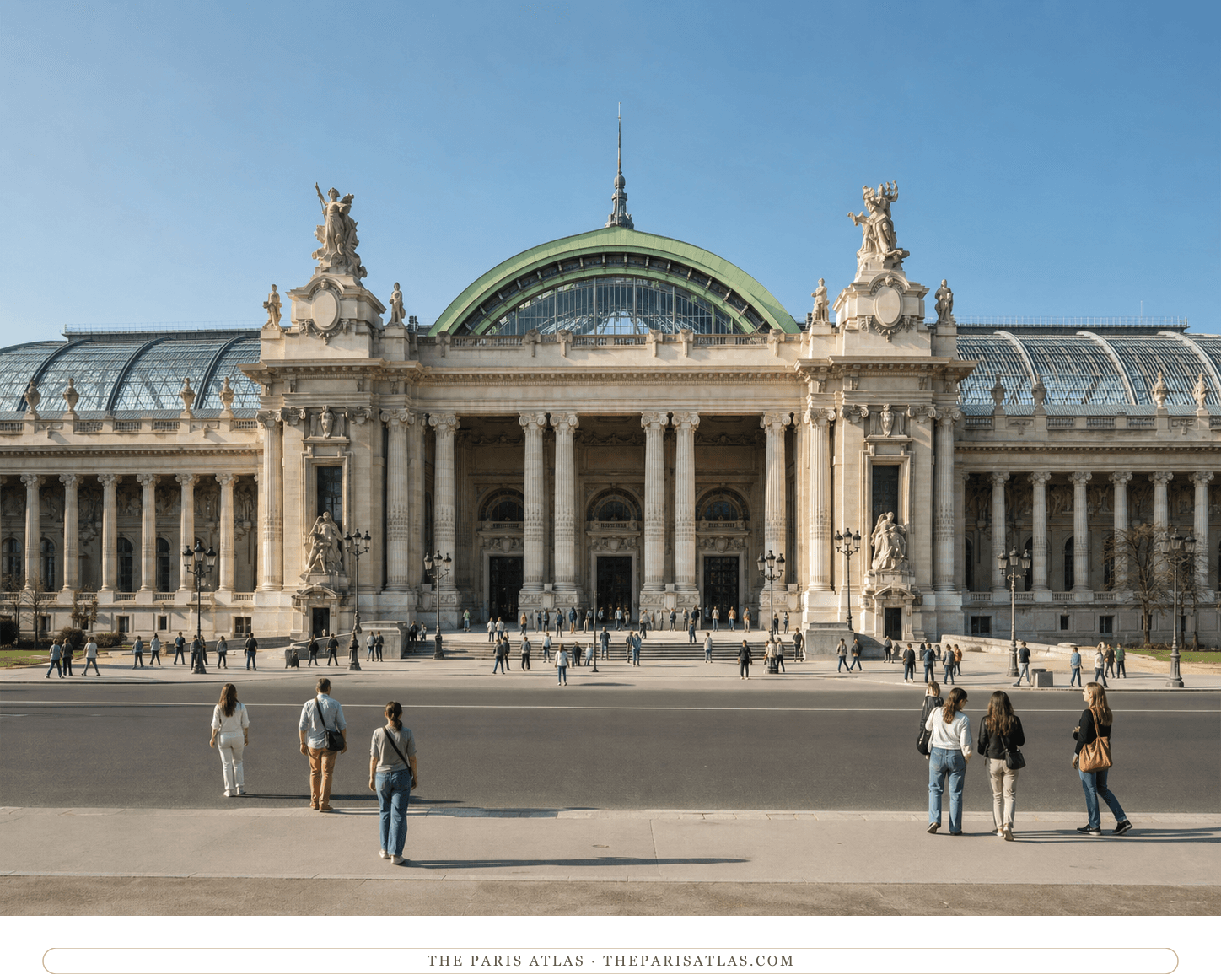 Present-day color view of the Grand Palais façade beneath a bright blue sky with visitors in front
