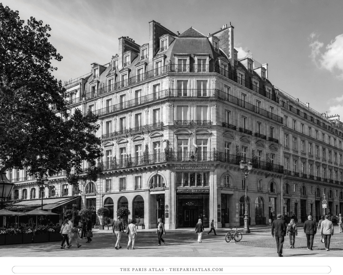 Black-and-white present-day view of the Hôtel du Louvre façade on place André-Malraux