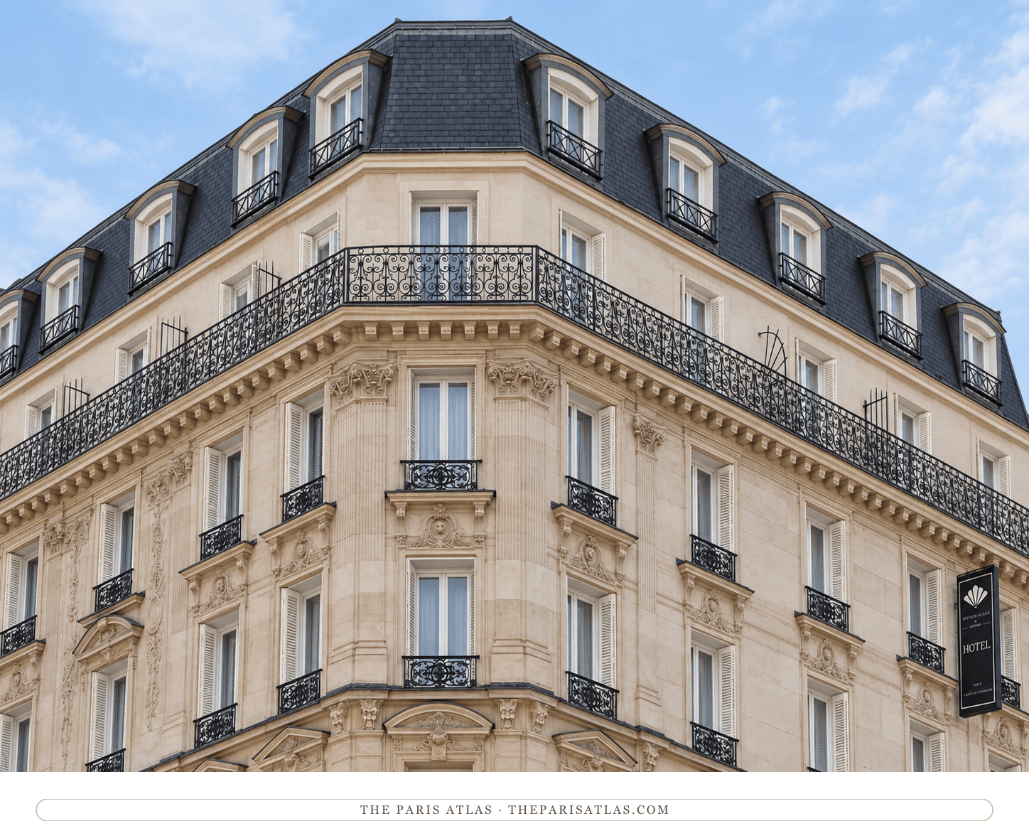 Illustration of Le Diamond’s pale stone corner façade, black iron balconies and slate mansard roof.