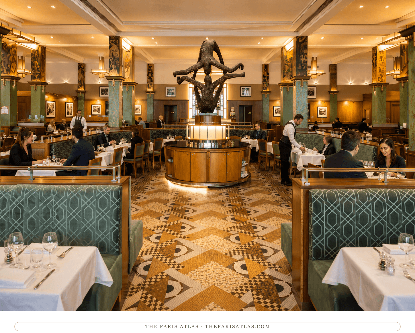 La Coupole's dining room today, green velvet booths and gilded painted pillars under the Art Deco ceiling