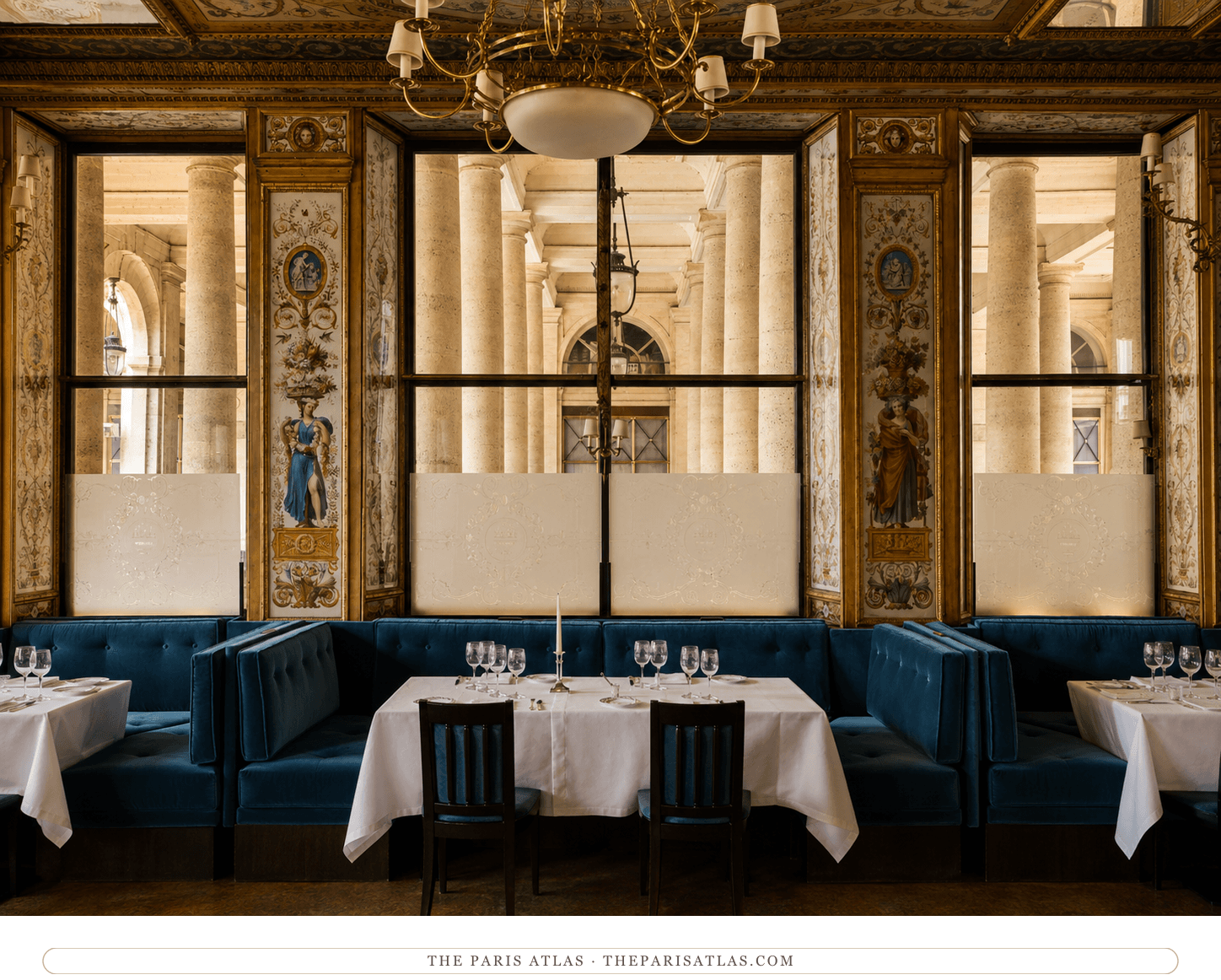 The Grand Véfour dining room in colour, its painted panels, mirrors and red banquettes