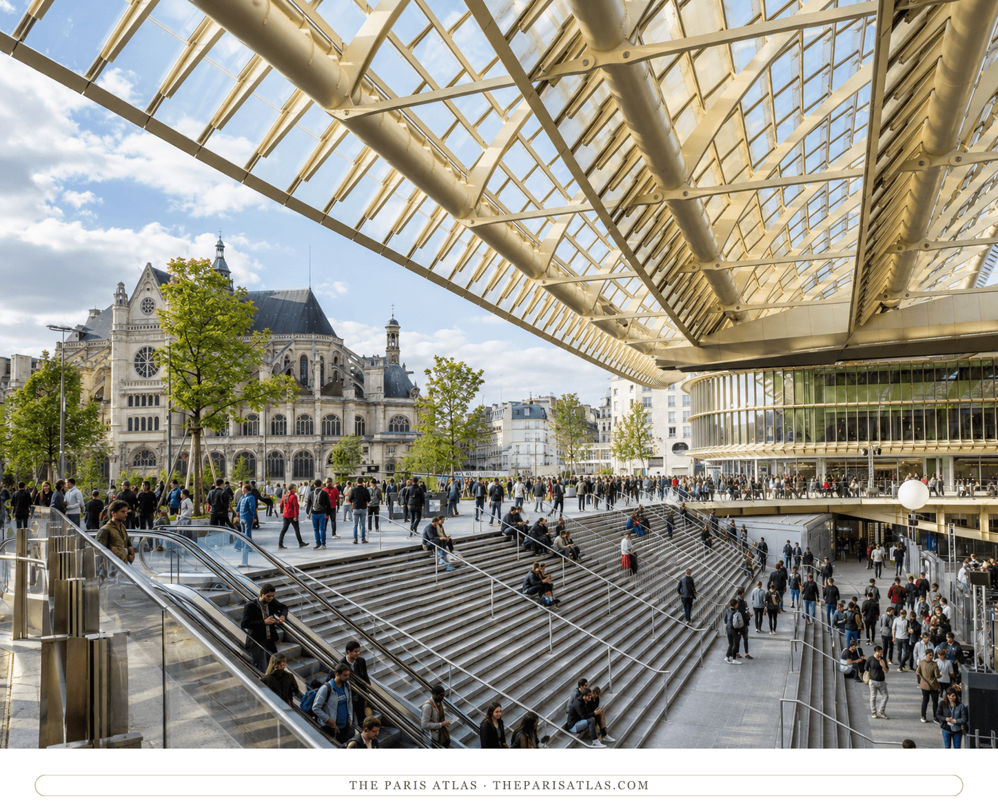 The same view in colour, the roof pale gold against a blue sky, trees and crowds on the steps