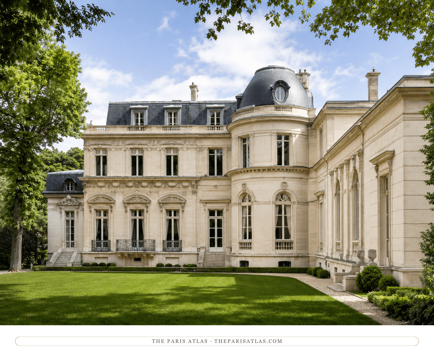 The garden façade of the Musée Marmottan Monet in colour — pale limestone, slate mansard and turret dome, sculpted swags above the windows, a lawn and clipped hedges in front