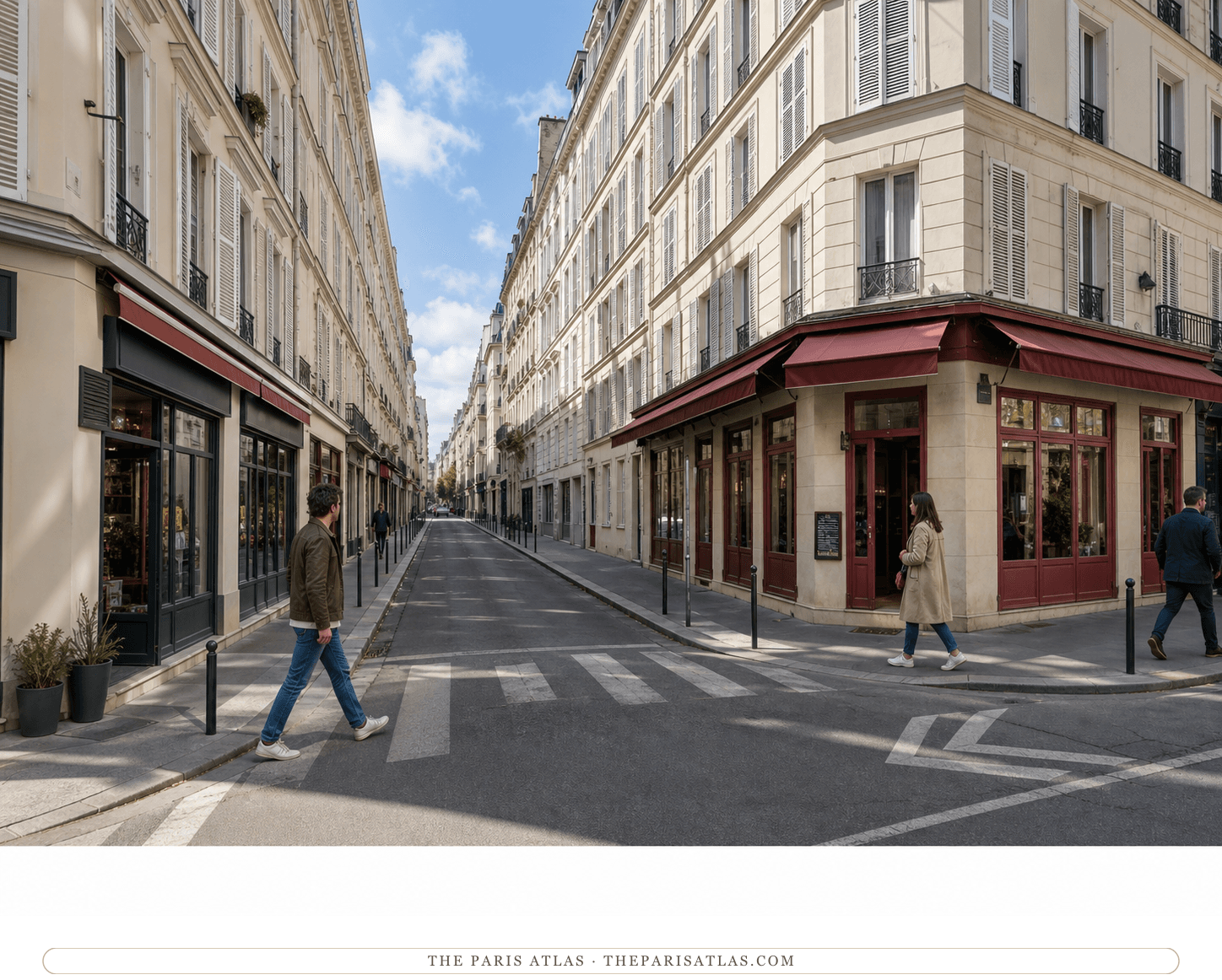 Present-day color view of the corner of rue La Bruyère and rue Jean-Baptiste Pigalle, with cream façades and burgundy awnings beneath a blue sky