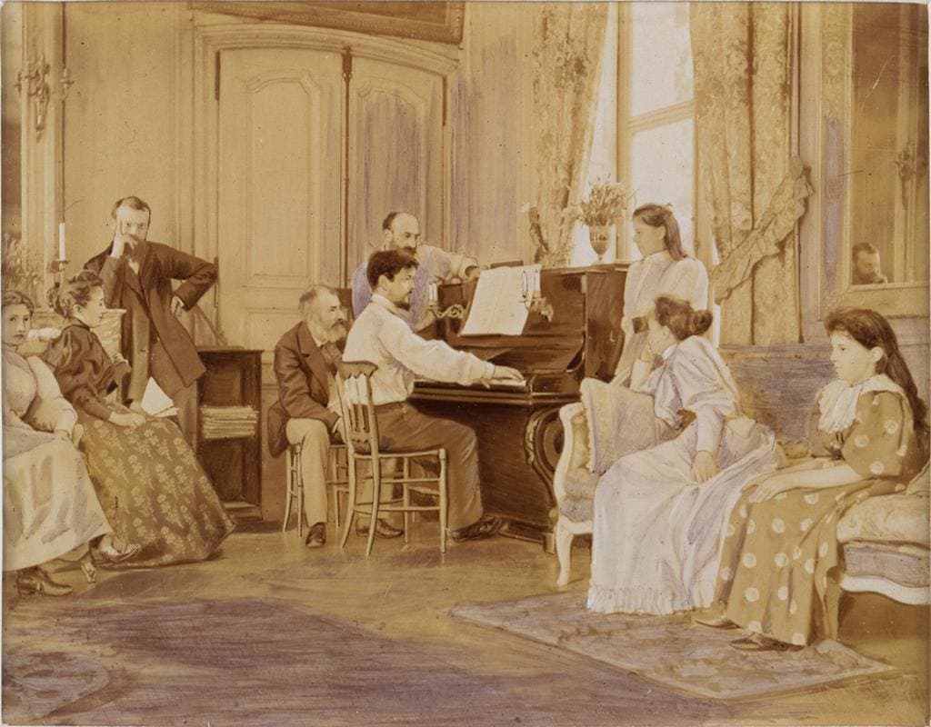 Claude Debussy playing the piano for friends in August 1893