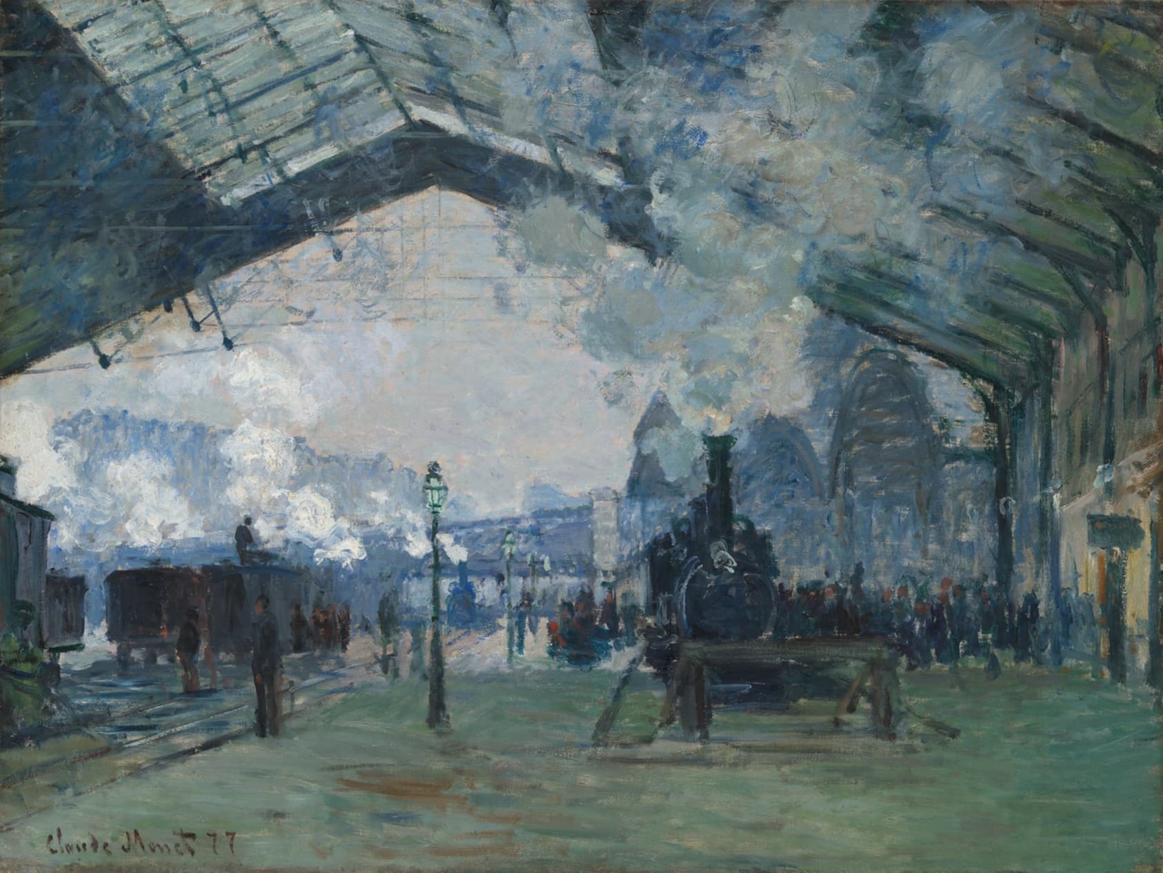 A locomotive under the glass-and-iron shed of the Gare Saint-Lazare, dissolving into blue steam and light