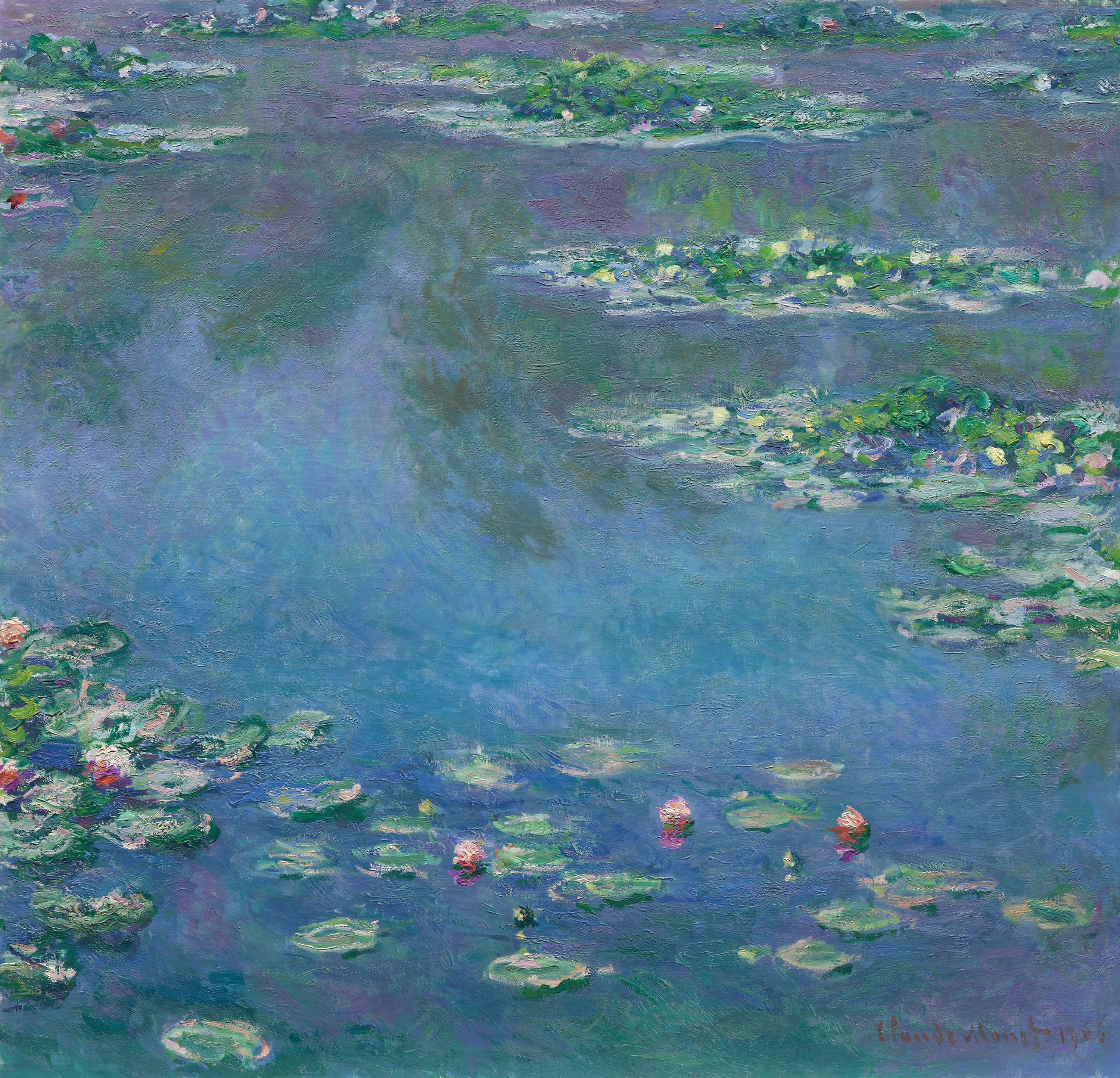 Close view of pink and white water lilies clustered among green pads in Monet's 1906 painting